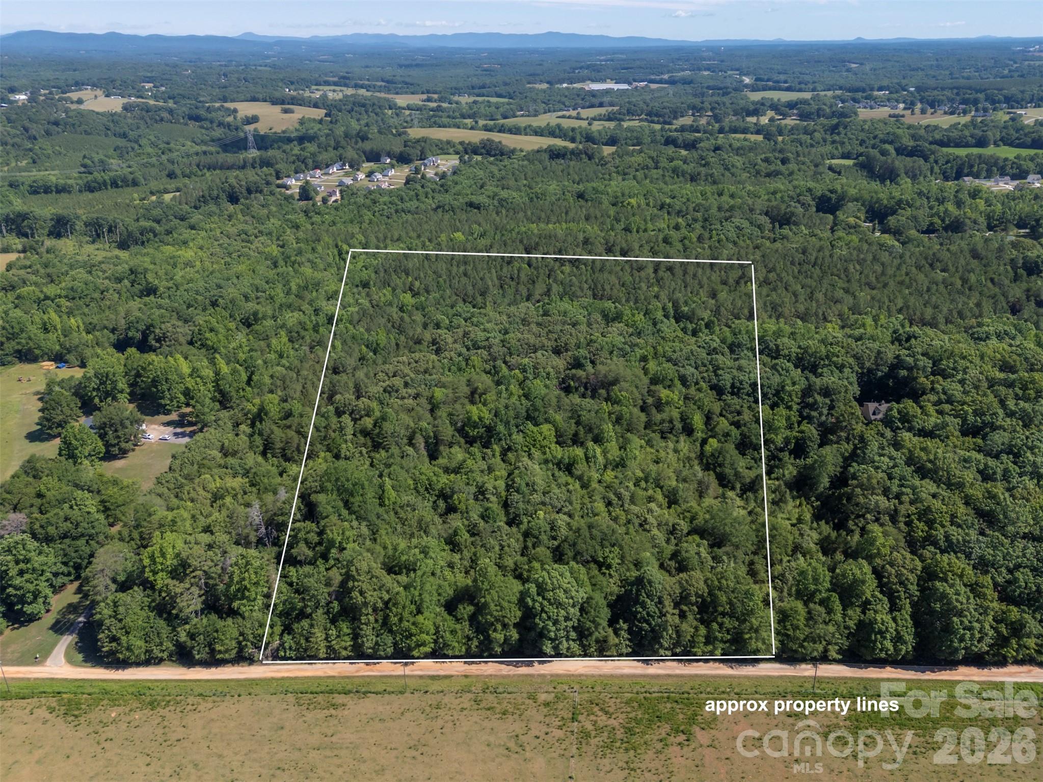 Discover the possibilities with this beautiful 20-acre wooded tract offering privacy, natural beauty, and a convenient location in the Boiling Springs area of Shelby. Whether you're dreaming of building your custom home, creating a private retreat, or investing in land for the future, this property provides the perfect setting. Mature trees and abundant wildlife create a peaceful atmosphere while still being just minutes from downtown Boiling Springs and Gardner-Webb University. Trees may be able to be harvested to offset the cost of building. Enjoy easy access to Highway 74, making travel to Gastonia, Charlotte, and surrounding areas simple and convenient. With plenty of room to explore, hike, or build, this unrestricted acreage offers endless potential. If you have been searching for a private setting with convenient access to nearby amenities, this exceptional property is a must-see.