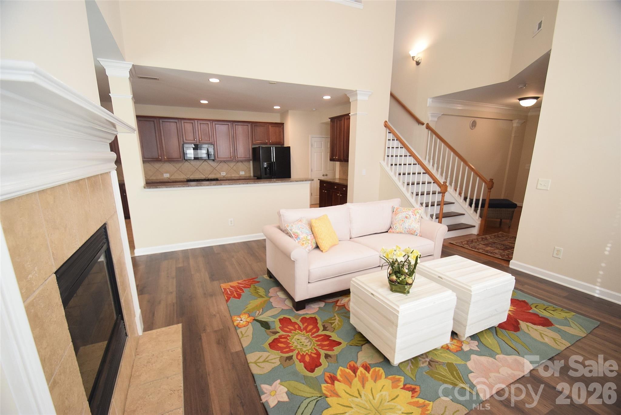 Improved price!! This home is set on the front row in Brighton Park of Mint Hill. There's only a handful of these privileged front row homes. A wonderful location, this home overlooks the walking park in downtown Mint Hill, with a great view from it's covered front porch. It is just a short walk to restaurants and groceries. The home has 3 bedrooms and the office on the main floor could be a 4th bedroom. The large kitchen features an abundance of cabinets, a pantry and a bar-stool area that is open to the Great Room. The Primary bedroom is also large and the bathroom has dual vanities, shower and garden tub. There are 2 more bedrooms upstairs and a nice loft area that overlooks the Great Room. The rear load 2-car garage also has ample parking in the driveway. And the back yard is fenced!