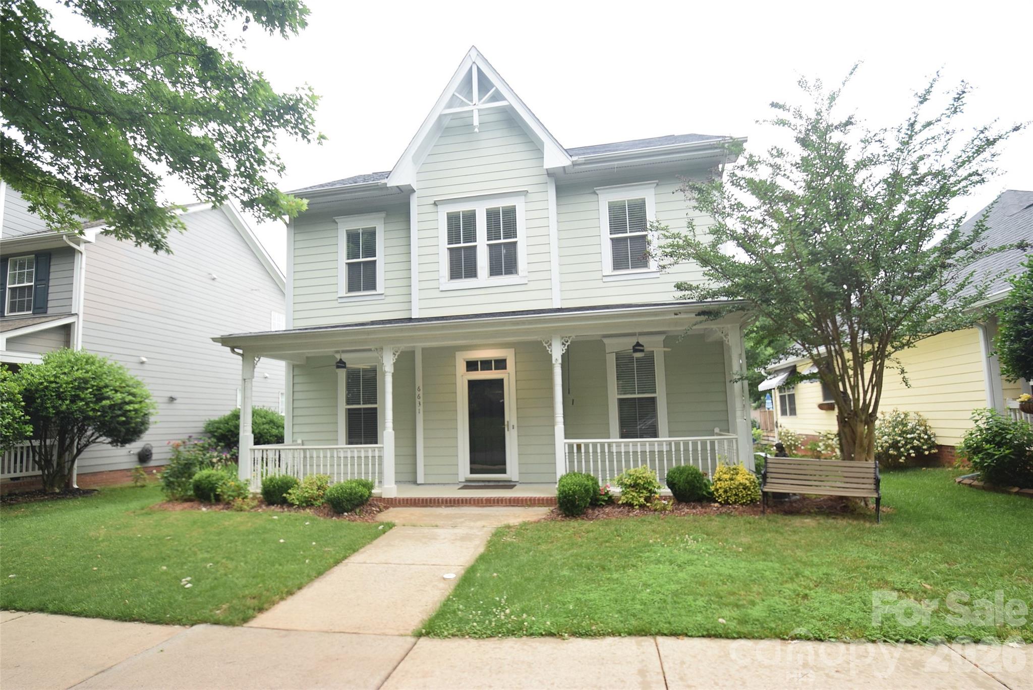 Improved price!! This home is set on the front row in Brighton Park of Mint Hill. There's only a handful of these privileged front row homes. A wonderful location, this home overlooks the walking park in downtown Mint Hill, with a great view from it's covered front porch. It is just a short walk to restaurants and groceries. The home has 4 bedrooms and the one on the main floor would also make an excellent office. The large kitchen features an abundance of cabinets, a pantry and a bar-stool area that is open to the Great Room. The Primary bedroom is also large and the bathroom has dual vanities, shower and garden tub. There are 2 more bedrooms upstairs and a nice loft area that overlooks the Great Room. The rear load 2-car garage also has ample parking in the driveway. And the back yard is fenced!