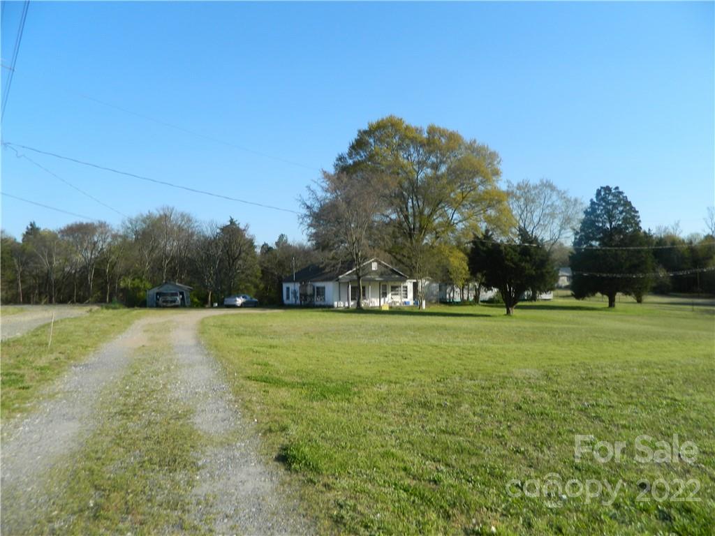 This property is located approx. 1/4 mile from Charlotte Motor Speedway with road frontage to Hwy 29/N Tryon St. It is currently zoned for residential use but can be rezoned with county approval. Convenient to I485, I85, Concord Mills, University Area and the Blueline. Great investment Property!
