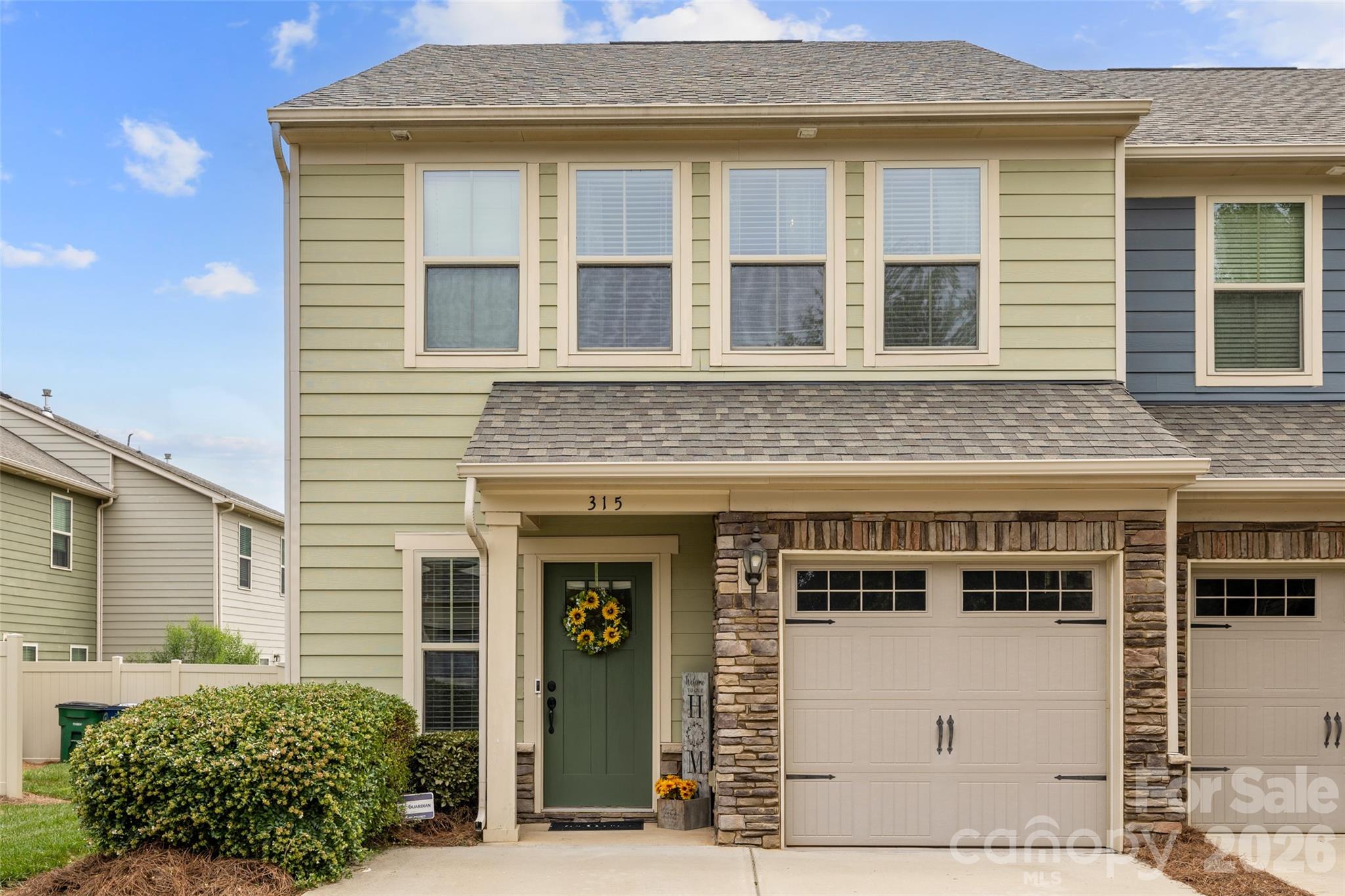 Welcome home to this beautifully maintained end-unit, two-story townhome featuring 3 bedrooms, 2.5 bathrooms, and thoughtful updates throughout. Freshly painted from top to bottom, this home offers a bright, inviting atmosphere, with new carpeting throughout most of the home. The spacious living room is equipped with a Klipsch home theater system, perfect for enjoying movies, music, and entertaining guests. In the kitchen, the seller has enhanced the space with a stylish steel backsplash, adding a modern touch. 

Step outside and enjoy the extended back patio, providing the ideal setting for relaxing or hosting family and friends. Unlike many homes in the neighborhood, in addition to the attached 1 car garage this property offers parking for two vehicles in the driveway, a rare and valuable feature. The primary suite includes upgraded features such as a frameless (hingeless) shower door, creating a sleek, spa-like feel. Additional highlights include a tankless water heater for energy efficiency and continuous hot water.

Don't miss the opportunity to own this move-in-ready townhome that combines comfort, convenience, and desirable upgrades in a sought-after community.