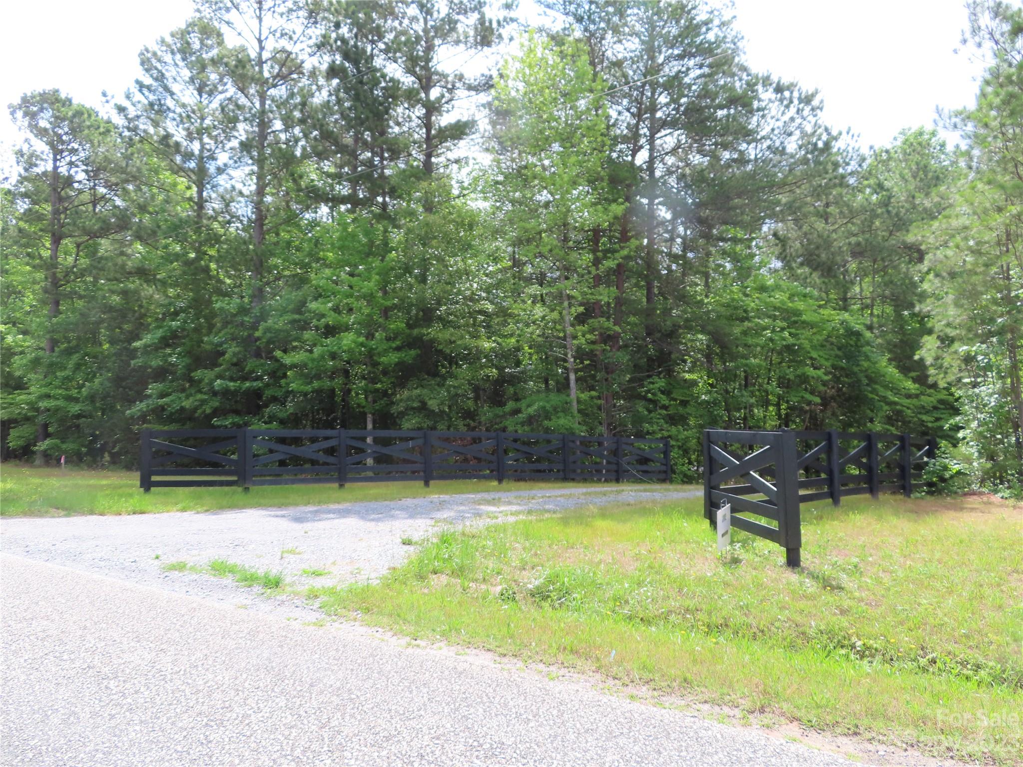 Want privacy? Like to hunt? Here it is! Not to far out and easy commute to York, Rock Hill & Charlotte. This particular tract has a hunting cabin and well. With a little work it would make a good workshop, craft cottage or a pool house. It has a bathroom but I could not locate a septic tank. There are 6 Tracts that can be bought. This one is 40.78 Acres. All showings have to be scheduled for Sundays only as there is a chain across the entrance and the listing agent/owner will be there to assist with any questions. The rear property line has a fence around the perimeter. Some of the tracts have a creek running through the back side of them. No mobiles or modulars. That is basically all of the restrictions except for the county AGC zoning restrictions of which can be found on WWW.yorkcountygov.com.
All 6 tracts are on a private driveway and everyone will need to share in upkeep of driveway.