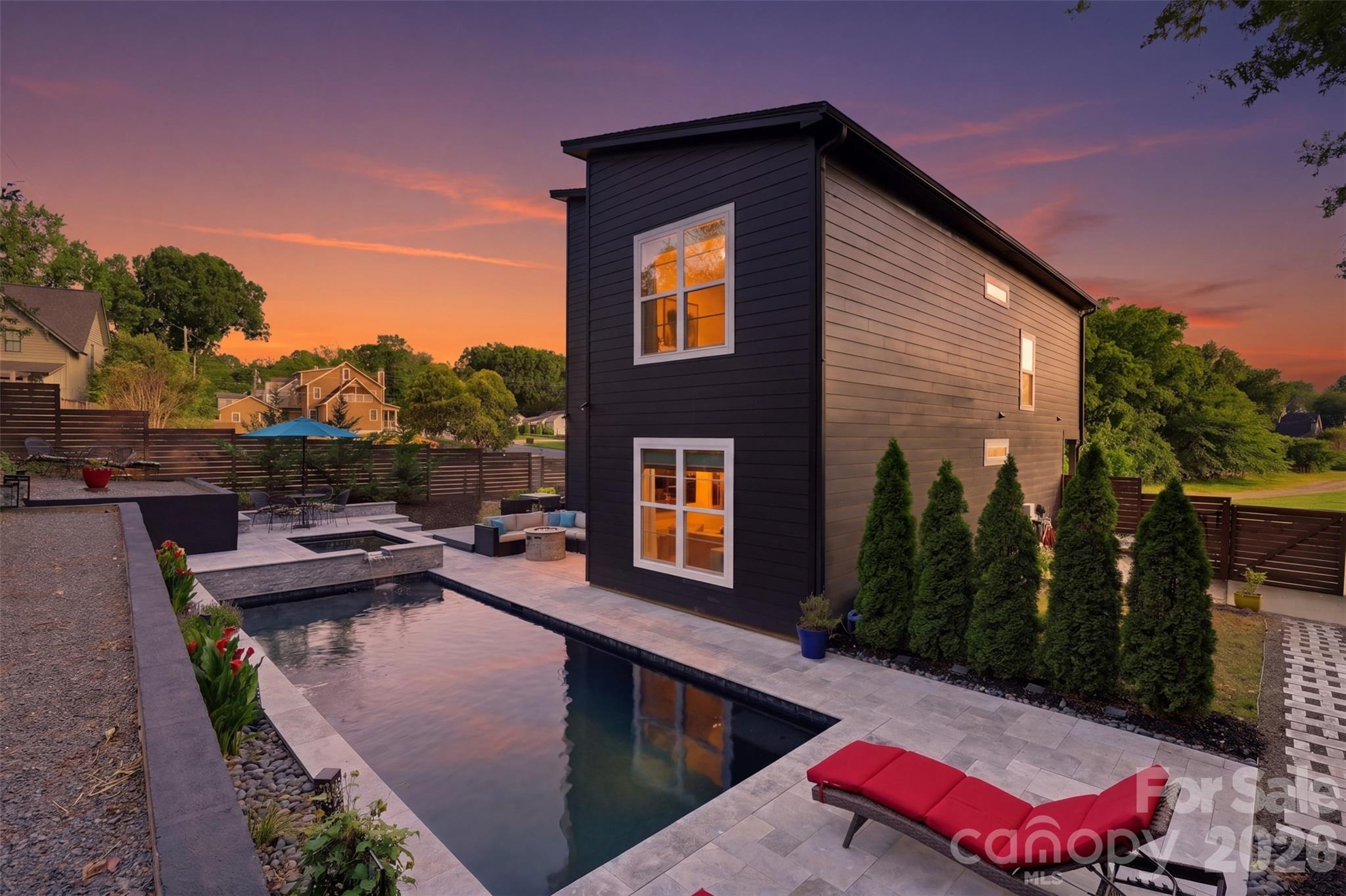 Experience elevated living in the heart of Charlotte’s booming Villa Heights neighborhood! This beautifully designed luxury home offers the perfect blend of modern comfort, upscale entertaining, and unbeatable walkability.

Step outside into your own private backyard retreat featuring a stunning resort-style pool — an entertainer’s dream and the perfect escape for relaxing summer afternoons, hosting friends, or enjoying quiet evenings under the Carolina sky. The seamless indoor-outdoor flow creates an atmosphere that feels like a private vacation home in the middle of the city.

Inside, the home boasts an expansive open-concept layout with oversized living spaces, abundant natural light, and thoughtfully designed finishes throughout. One of the standout features is the generously sized bedrooms, offering exceptional flexibility for families, guests, home offices, or luxury owner’s suites rarely found in intown living. Each room provides ample space, comfort, and privacy, creating a true retreat feel throughout the home.  The home features the latest smart home technology, powered by Alexa.

Located just moments from the vibrant arts, entertainment, and restaurant scene of Charlotte's booming NoDa (North Davidson) neighborhood.  Relax and enjoy the charm and residential neighborhood feel that makes Villa Heights so desirable.  You can walk to Cordelia Park, Unban District Market, Sunflour Baking, or Crossfit.  Easy walk to the 25th Street Light Rail Station.

This is the rare opportunity to enjoy luxury living, resort-style amenities, and walkable urban convenience all in one exceptional property.