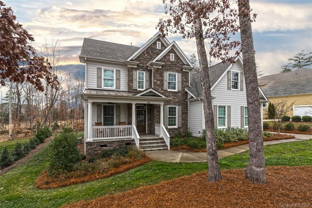 This is a terrific home. Open floor plan, with lots of usable rooms! Many custom features, including high-end kitchen, great-room built-ins, mudroom built-ins and gorgeous trim details throughout. No carpeting - hardwoods throughout first & 2nd story! Screened porch with fireplace. .83-acre premium lot. Newly built patio & outdoor kitchen area, overlooking deep backyard that abuts a golf tee. Fridge, washer & dryer included. Includes built-in speaker system. Pool table & golf cart negotiable.