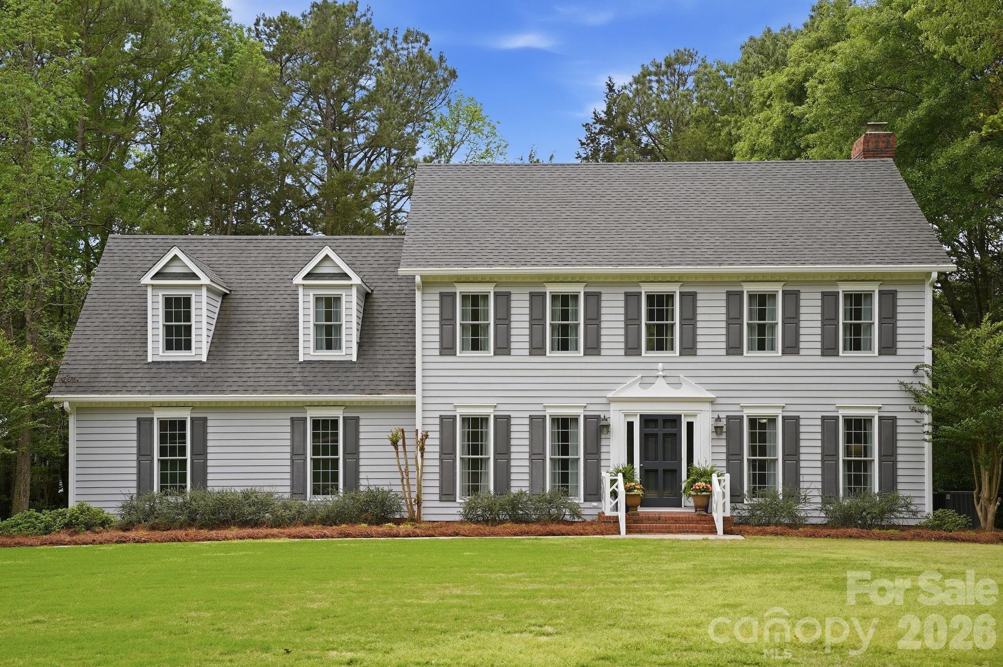 Welcome to this beautifully maintained home nestled in one of Rock Hill’s most sought-after neighborhoods. This vibrant community offers an exceptional lifestyle with amenities including a clubhouse, pool, four scenic lakes, tennis courts, and golf cart-friendly streets—perfect for enjoying the outdoors and connecting with neighbors.

Step inside to a welcoming foyer that sets the tone for the spacious and functional layout. The main level features a formal dining room, a comfortable family room, and a cozy living room complete with a fireplace—ideal for relaxing evenings. The bright breakfast area flows seamlessly into the chef's kitchen, which includes a convenient pantry for added storage.

Upstairs, you’ll find a versatile flex room with its own private staircase, offering endless possibilities for a home office, media room, or guest retreat. The second floor also includes three generously sized bedrooms, each with spacious closets. The primary suite is a true retreat, featuring an en-suite bathroom with dual vanities, a separate shower, and a soaking tub.

Outside, enjoy an oversized deck overlooking the gorgeous backyard—perfect for entertaining or unwinding. A long driveway provides ample parking and enhances the home’s curb appeal.

This home combines comfort, space, and a fantastic community setting—don’t miss the opportunity to make it yours!
