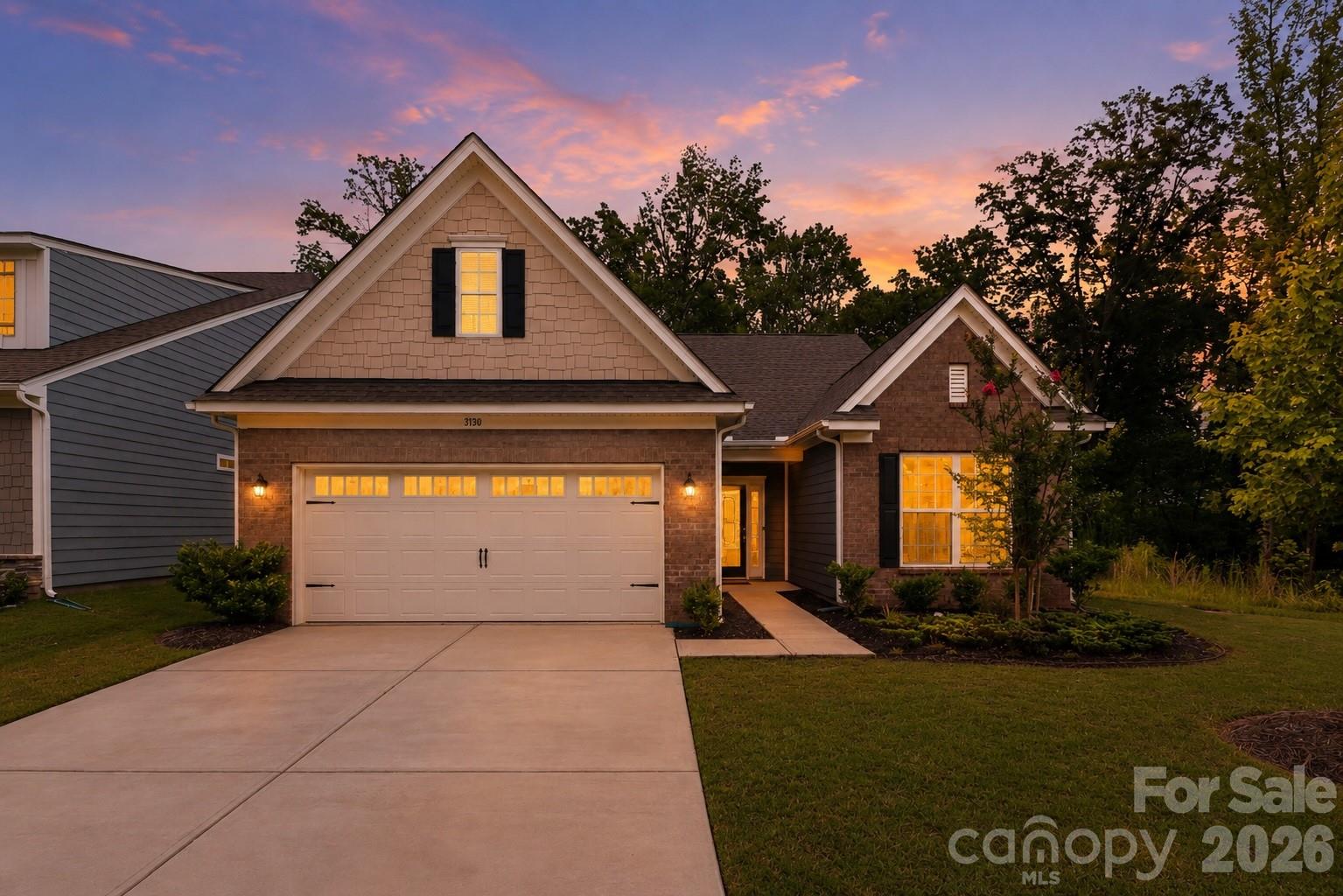 Experience low-maintenance luxury living in Windhaven’s sought-after 55+ section, ideally located in the heart of Tega Cay. This beautifully designed 3 bedroom, 3 bathroom home offers an open, light-filled floor plan with upscale finishes and flexible spaces for everyday living. The gourmet kitchen anchors the main living area with abundant cabinetry, a large center island, double ovens, and plenty of space to gather. The adjoining living room features custom built-ins and a gas fireplace, while the private dining room is perfect for holidays and special occasions. Automatic window shades add convenience throughout the home. The spacious main level primary suite provides a relaxing retreat with a beautifully finished bathroom, oversized walk-in shower, and generous walk-in closet and private access to the screened porch. Additional bedrooms offer flexibility for guests or a home office. Upstairs, the large loft creates a second living area ideal for movie nights, games, or quiet relaxation. Step into the screened sunroom and enjoy a peaceful space for morning coffee or evening downtime. Windhaven connects directly to the Tega Cay trail system, offering miles of paved trails for walking and biking. Lake Wylie, Windjammer Park, the Tega Cay Golf Club, and Stonecrest shopping and dining are all just minutes away. The highly anticipated Grove at Tega Cay will bring a new downtown destination featuring dining, entertainment, recreation, and green space nearby. With an exceptional location, refined design, and access to everything that makes Tega Cay special, this home offers far more than a place to live—it offers a lifestyle!