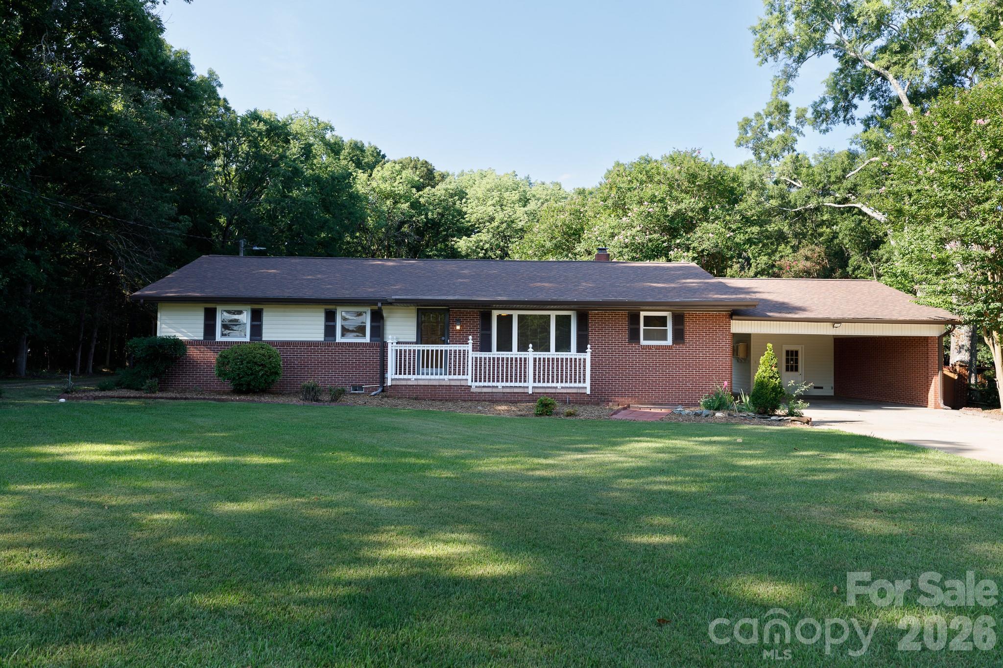 Enjoy peaceful living in this charming full brick 3-bedroom, 2-bath home within 10 minutes of I77 and Lewisville Community. This home offers a functional floor plan with comfortable living spaces, beautiful sunroom, large back deck, well-sized bedrooms, and two full bathrooms. The meticulous detail in this house, carport, and storage building make this a MUST-SEE property. 
The private backyard provides room to relax, garden, entertain, or simply enjoy the outdoors. With space to breathe and no crowded neighborhood feel this property is ideal for those seeking comfort, privacy, and a touch of country living.  Located close to Chester Golf Course, schools, dining, shopping, and both Chester & Richburg.