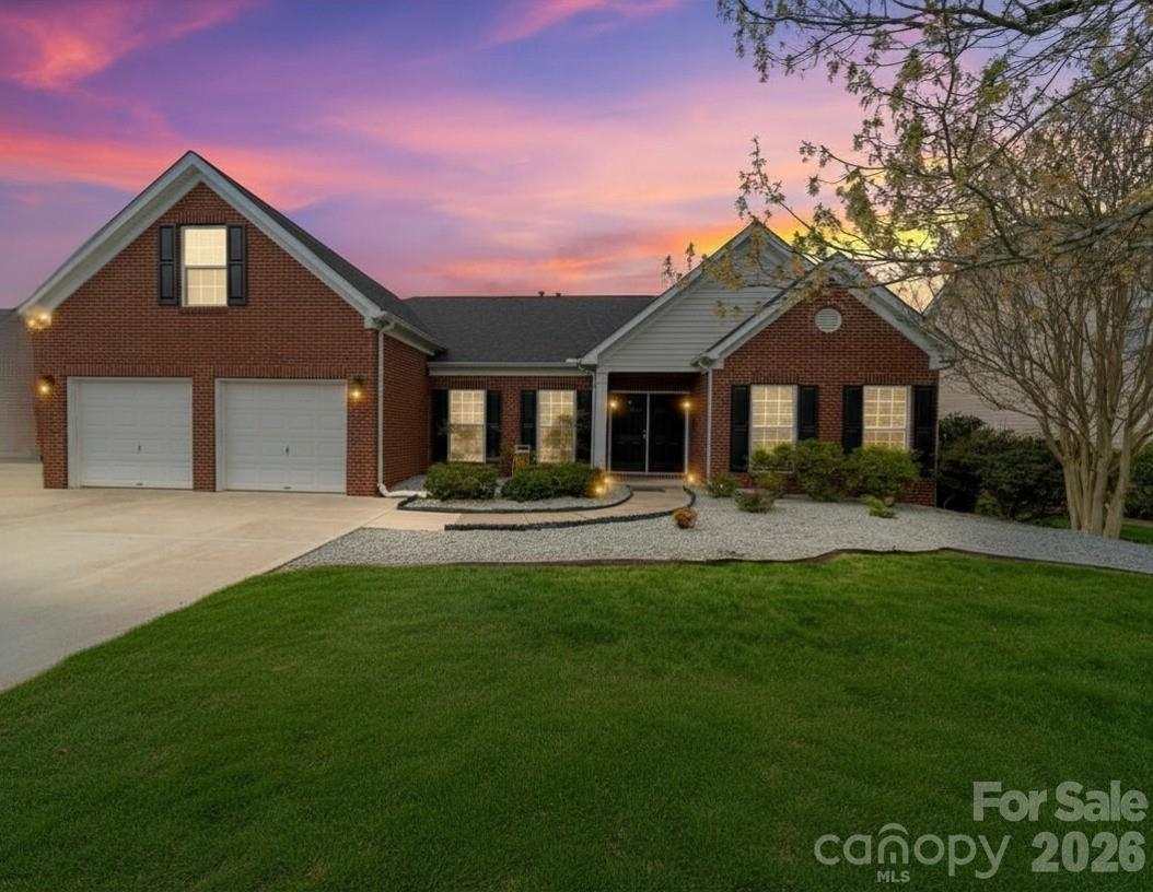 Welcome to this beautiful ranch home with bonus room in sought-after Moss Creek Village in Concord! This well-maintained home offers three bedrooms conveniently located on the main level and a spacious bonus room with a closet that can serve as a fourth bedroom, guest suite, or flex space.  Step inside to a huge welcoming entry hall that opens into the main living areas featuring durable and stylish LVP   flooring throughout the great room, kitchen, dining area, and hallway. The open floor plan is perfect for both everyday living and entertaining, with a spacious great room that flows seamlessly into the kitchen and dining area.  The kitchen features granite countertops, stainless steel appliances, ample cabinet space, and a functional layout that makes cooking and gathering easy and enjoyable. The main level primary suite offers comfort and privacy, while two additional bedrooms provide flexible space for family or guests. There is also an additional living room that could be converted into a home office or 5th bedroom or any other space you desire!  The large bonus room with a closet makes a perfect fourth bedroom, media room, playroom, or home gym. Outside, you’ll love the attractive brick front, well-maintained landscaping, and welcoming curb appeal. Located in Moss Creek Village, this community offers fantastic amenities and convenient access to shopping, dining, and major highways. This home combines the ease of ranch-style living with the extra space of a bonus room — the perfect blend of comfort, functionality, and location.  Seller will provide a 1-year home warranty through Old Republic, washer, dryer and refrigerator to remain!
