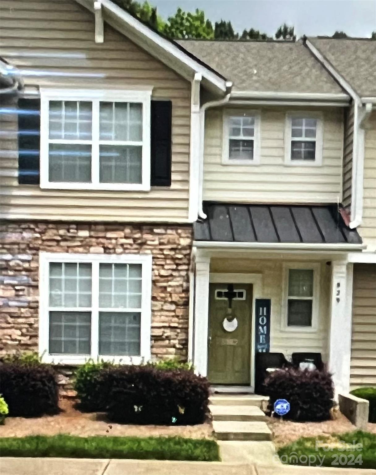 Perfect for individual seeking convenient living in an ideal location, this 3 bed/2.5 bath town home is situated in the highly desirable Ridge Pointe community of Rock Hill, South Carolina. The home features, beautiful hardwoods on the main level, downstairs office,  and owners' suite. The eat-in kitchen with bar has stainless appliances, granite counters, ceramic tile backsplash, pantry, and separate dining area. The open floor plan also includes a spacious great room with a fireplace. Upstairs you'll find the owners' suite with walk-in closet and private bath, two additional bedrooms, laundry area, and full bath. Enjoy the outdoors on your covered front porch or private fenced patio. This well-maintained community offers, walking trails, a community clubhouse, pool, and playground for your enjoyment. Conveniently located minutes from shopping, dining, I– 77, and a short commute to Charlotte, North Carolina. This home has it all.