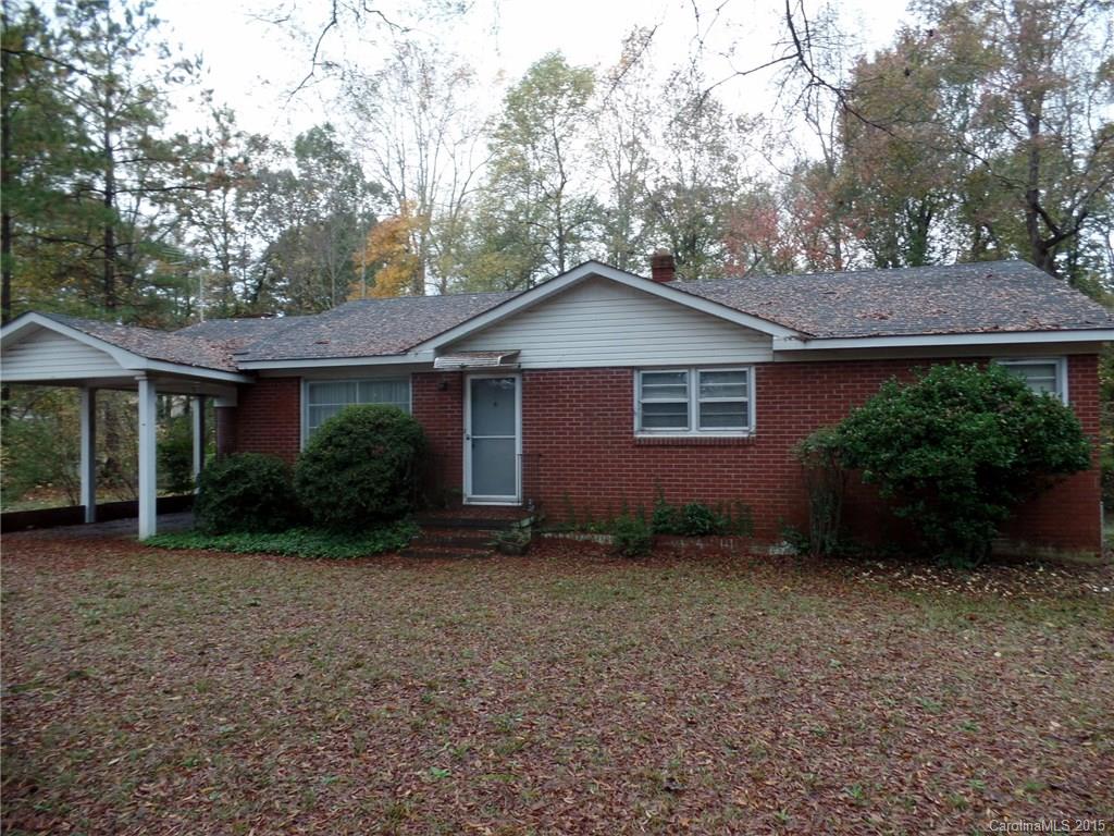 Cozy 3BR/1.5BA brick ranch needs TLC near schools, shopping & I-77.  Home has formal LR, DR, Den, fireplace, gas logs & kitchen on almost an acre lot with detached storage, carport & fencing.  Put your stamp on this fixer-upper home with your upgrades & décor.