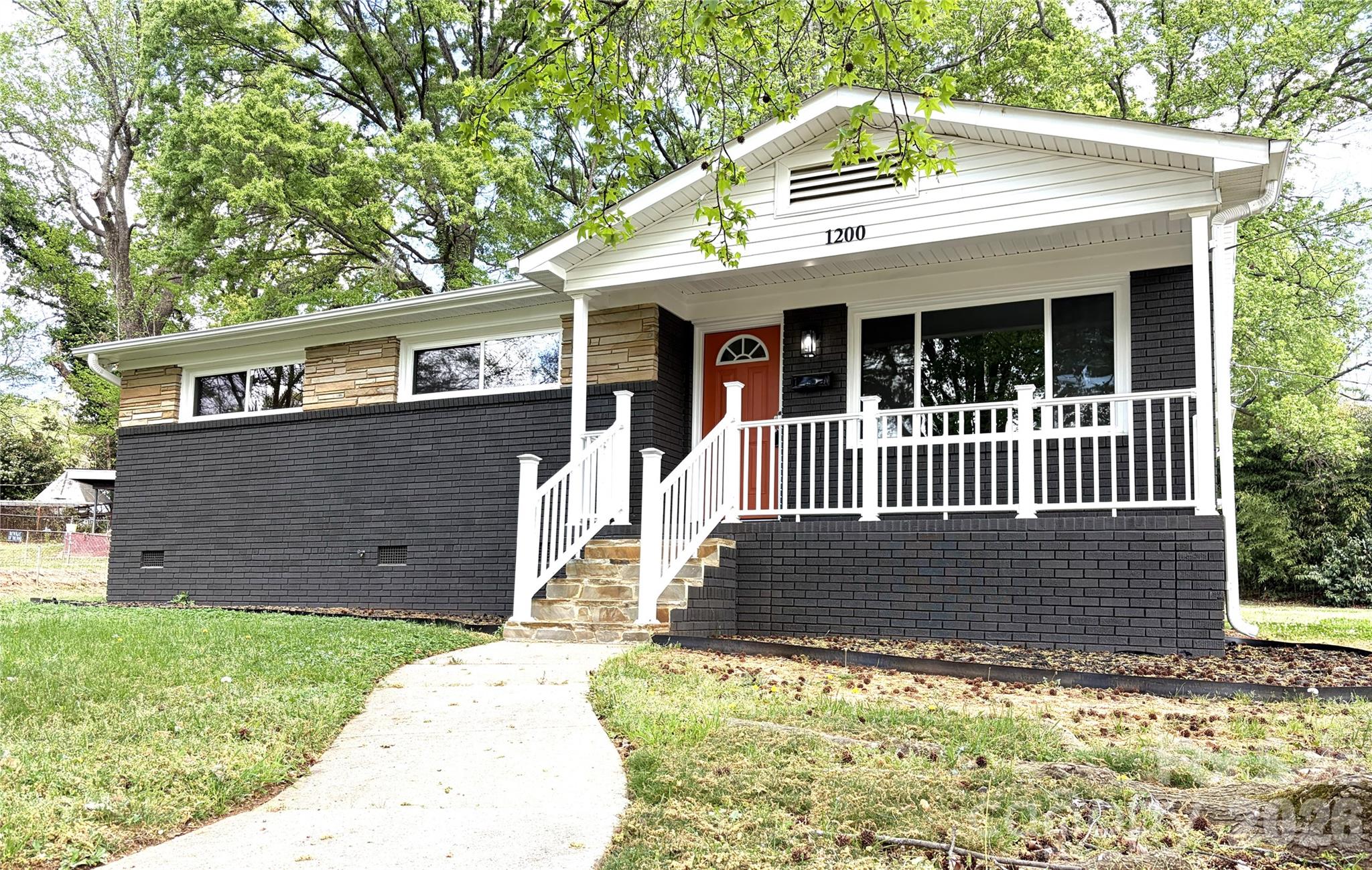 BACK ON MARKET DUE TO NOT FAULT OF THE SELLER!! SELLER IS MOTIVATED!! Fully renovated and move in ready, this Charlotte home offers modern updates in a location that keeps you close to everything. Blending classic charm with thoughtful updates, the home features a bright, open layout with new flooring throughout, designed for both everyday living and easy entertaining. The kitchen has been completely refreshed with new cabinetry and modern appliances, creating a functional and stylish centerpiece. Both bathrooms have been updated, including a newly added full bath in the primary suite for added comfort and convenience. Major improvements provide peace of mind. Roof (2024), HVAC, heat pump and water heater (2025). Attic and crawlspace are insulated. Enjoy the inviting front porch, spacious outdoor area and ample parking, all while being just minutes from Uptown, the airport and a variety of shopping and dining options.