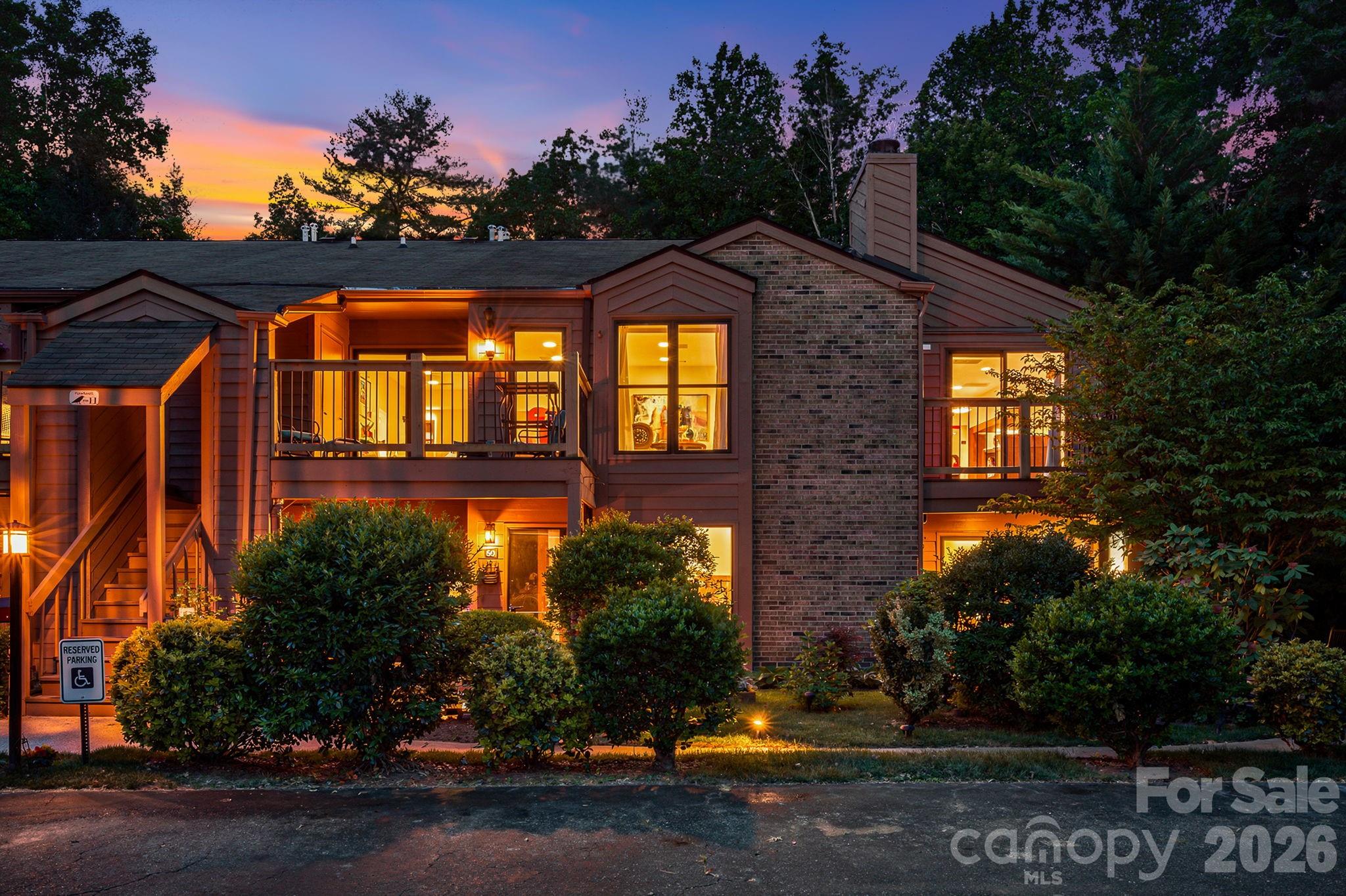 Immaculate end unit condo less than 20 minutes from downtown Asheville. Light and airy with vaulted ceilings, updated kitchen and bathrooms, and vinyl plank flooring. This upper level, unit is located at the back of the Ravencroft community where traffic is minimal. The living room features a gas fireplace, and large dining space. The exterior features a large private balcony, and a storage closet. Come take a look, this unit presents a great value, close to town! Inspection available.