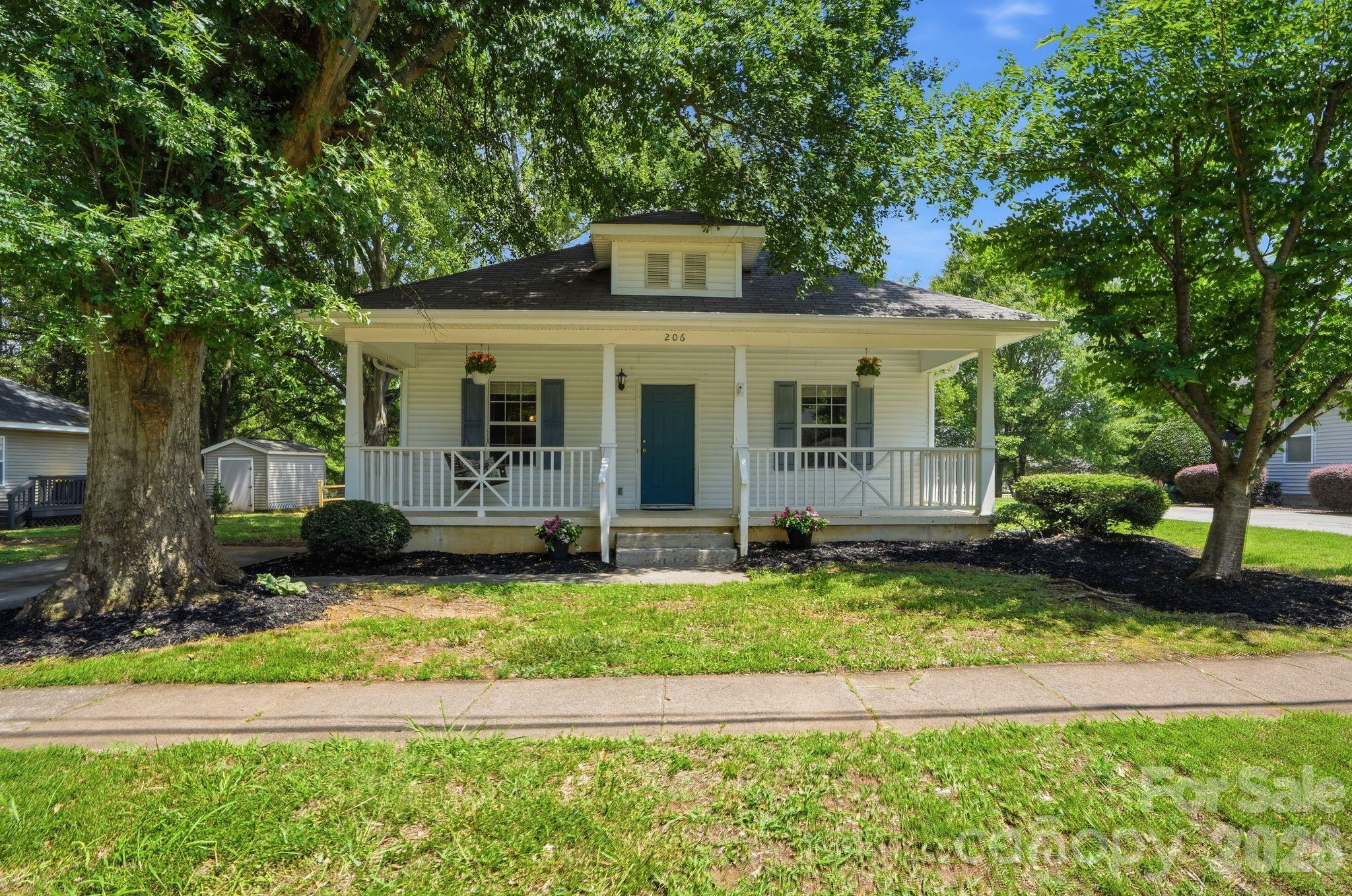 This adorable 2-bedroom, 2-bath white cottage is nestled in a quaint, established Belmont neighborhood and offers a fully fenced backyard with plenty of space to relax, entertain, or let pets play. Just minutes from the heart of Downtown Belmont, you’ll love the nearby parks, local restaurants, coffee shops, and the quick commute to Charlotte Douglas International Airport. Whether you’re searching for your next home, a rental property, or a long-term investment, this charming home is full of potential in one of Belmont’s most desirable locations. Don’t miss this opportunity!