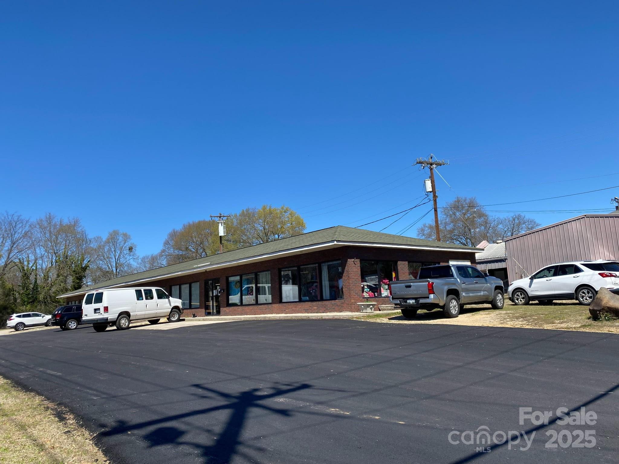 THE BUILDING ONLY...The beauty of this deal is you can run with this florist with building and content including a delivery van, and a tenant in a portion of the 4500 square foot OR do what you wish and turn it all to rental or can divide to make possibly 3 units; building includes 2 walk in coolers - call with any questions.