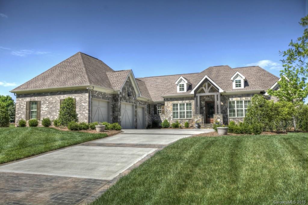 Southern charm! Rare opportunity created w/this full brick 2 year old custom ranch w/much attention to detail.   True gourmet chef's kitchen w/granite dual level island, linear tile backsplash, 5 burner cooktop, warming drawer, wine fridge & more!  Gorgeous hardwoods throughout w/exception of 2 bedrooms. Gas log fireplace in cozy den.  Great room w/coffered ceiling, built in's, gas fireplace and French doors open to truly wonderful screened in porch.  Luxury MBR, Huge closet/system - a must see!