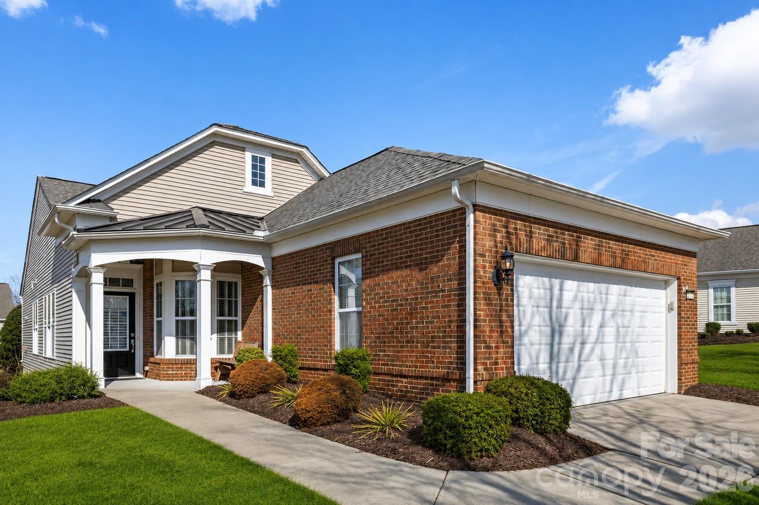 Beautifully maintained Pine Spring with sunroom on an oversized homesite in sought-after Sun City Carolina Lakes. Designed for easy living, this home offers a bright, open layout filled with natural light and comfortable gathering spaces. The kitchen features granite countertops, under-cabinet lighting, ample cabinetry, and a well-designed layout that flows seamlessly into the main living and dining areas, ideal for everyday living and entertaining. Customized shelving and drawer systems in the kitchen and bathroom cabinets maximize storage and organization. Electric shades in the living room, dining room, and kitchen provide added convenience.
The spacious primary suite offers a private retreat, while the secondary bedroom and full bath provide comfortable accommodations for guests. A versatile flex space is currently being used as a bedroom, offering flexibility to fit a variety of needs such as a home office, hobby room, or additional guest space. The sunroom adds valuable additional living space, perfect for morning coffee, hobbies, or a quiet reading room.
Outside, extensive landscaping and an in-ground irrigation system make maintenance simple, while the extended driveway provides added parking and everyday convenience. A new roof installed in November 2025 adds long-term value and peace of mind. Handicap-accessible features include a garage handicap ramp for added convenience.
Located in Sun City Carolina Lakes, residents enjoy resort-style amenities including championship golf, indoor and outdoor pools, a fitness center, tennis and pickleball courts, walking trails, lake access, woodworking and craft studios, social clubs, and a full calendar of activities. Lawn care and a vibrant, active adult lifestyle are part of what makes this community so desirable.