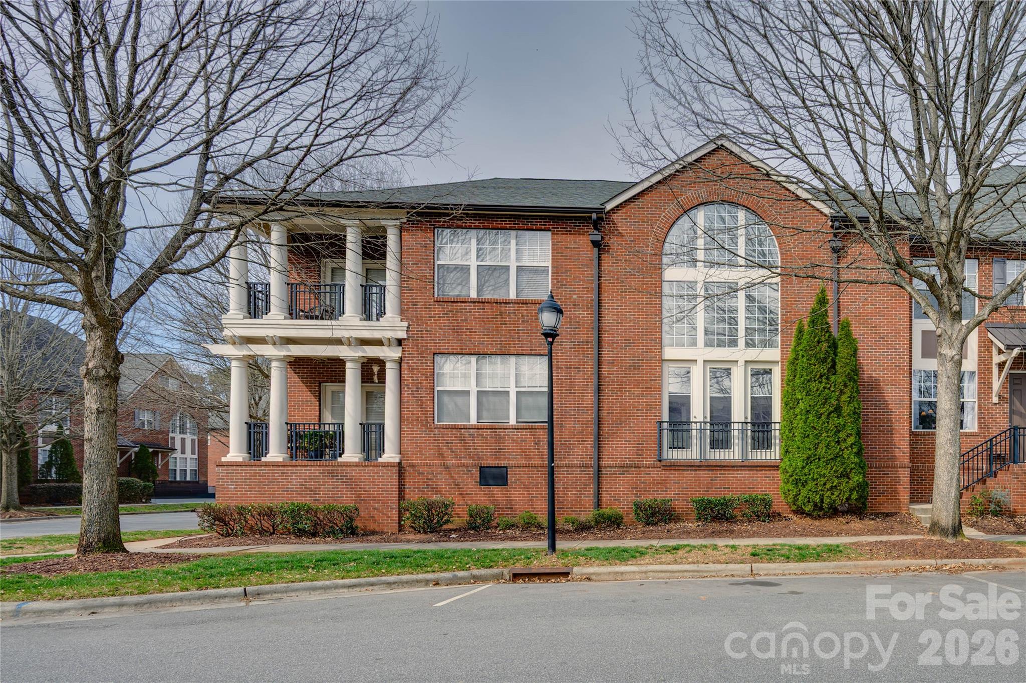 Live the lifestyle you’ve been waiting for in this stunning, light-filled one-bedroom condominium in the heart of Mooresville. This rare find blends loft-style living with modern comfort, featuring soaring ceilings and expansive windows that create a bright, open feel throughout the home. The chef-inspired kitchen offers stainless steel appliances and generous counter space, perfect for both everyday living and entertaining. With 1,237 square feet of open-concept living space, this condo provides far more room and flexibility than a typical one-bedroom. Whether you’re searching for a full-time residence, weekend retreat, or low-maintenance living, this property is ready for you. Convenience is key with assigned parking, ample guest parking, and an in-unit washer and dryer included. Conveniently located between downtown Mooresville and historic Davidson, you’ll enjoy easy access to restaurants, shopping, and Lake Norman recreation. Lowe’s Corporate Headquarters and Duke Lake Norman Hospital are in walking distance, making this location as practical as it is desirable. Don’t miss this opportunity to own a spacious, loft-style condo in one of the area’s most convenient locations.