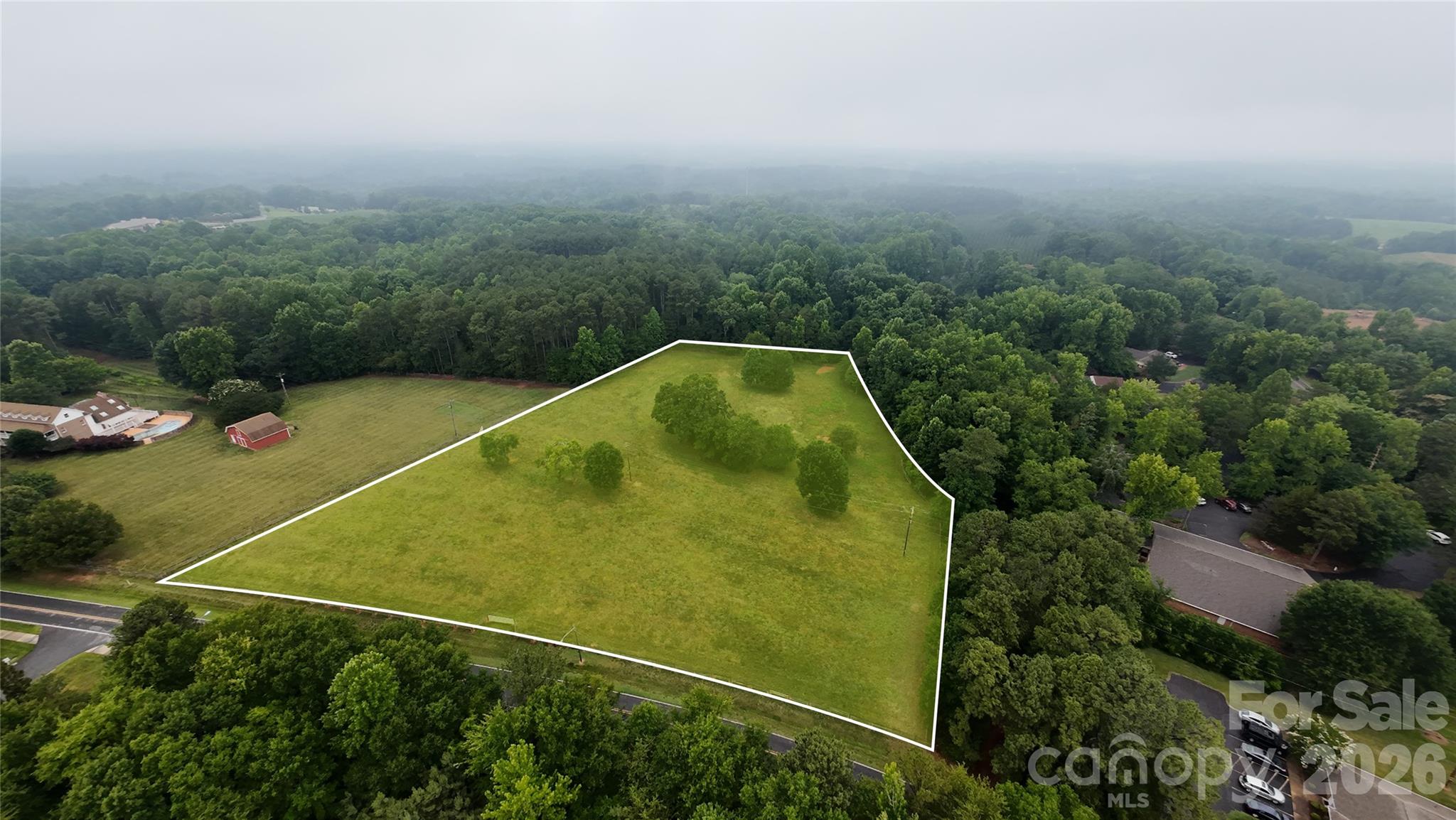This cleared pasture is fenced and zoned RO.  Less than two miles to the nearest hospital and less than three miles to Uptown Shelby's dining, shopping and more.  This property is ideally situated.  Only available for sale with the purchase of MLS #4383660.