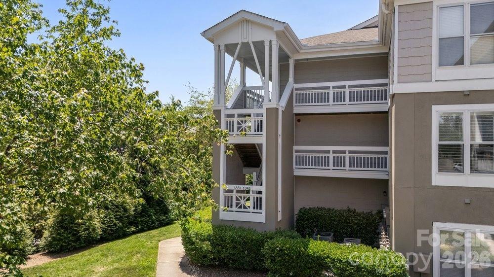 Lakefront living awaits in this nicely updated condo in Davidson Landing’s Emerald Bay. Enjoy long-range, year-round views of Lake Norman from the open-concept living area, anchored by a gas-log fireplace and sliding doors to a covered balcony. This one-level home offers approximately 1,156?sq?ft with two bedrooms and two baths. The refreshed kitchen features nice cabinetry, granite countertops and stainless appliances, while the primary suite includes balcony access and a newly updated en-suite bath. Additional updates include LVP flooring, upgraded bathroom vanities and fixtures, and in-unit laundry. An assigned parking space adds convenience.

Emerald Bay residents enjoy resort-style amenities including a lakeside pool, tennis courts and walking/fitness trails. Monthly HOA dues cover exterior maintenance and common-area upkeep. Davidson Landing also offers boat slips for rent, a dock/pier, playground and lakefront recreation area, making it easy to embrace the waterfront lifestyle. This turnkey condo is minutes from Davidson College, downtown shops and restaurants, and I-77. Whether you’re seeking a primary residence, vacation retreat or investment opportunity, this home combines comfort, modern updates and spectacular Lake Norman views.