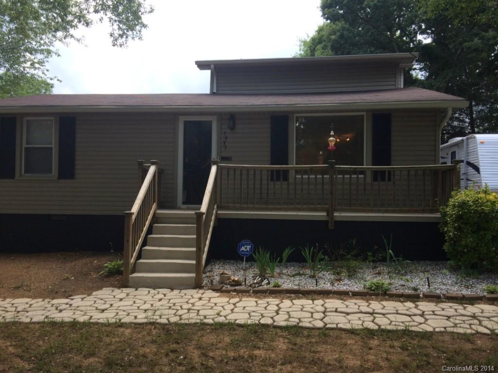 Nice 3 bed/2 bath home.  Laminate floors, new roof, kitchen island and refrigerator(2012) convey.
Woodstove in great room (2012) Driveway on each side of the house.