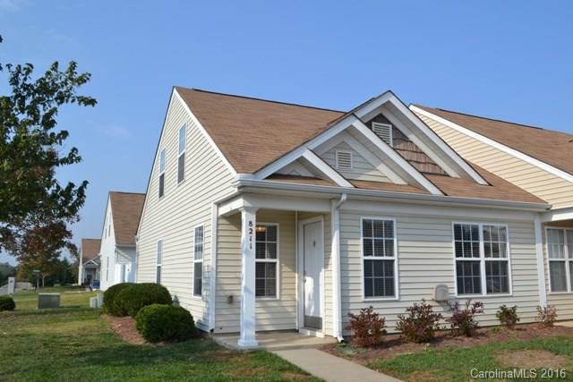 This is an awesome end unit town home in a great neighborhood.  Shows like a model home!  Spacious great room/dining area, granite kitchen with dishwasher, range, microwave and pantry. Two bedrooms on main level with hall bath, master suite located upstairs with private bath!  enced patio area area is great for privacy and animals!  Neighborhood has a pool and sidewalks.  Great access to Charlotte and Lancaster!  This area is growing by leaps and bounds! BA to verify schools.