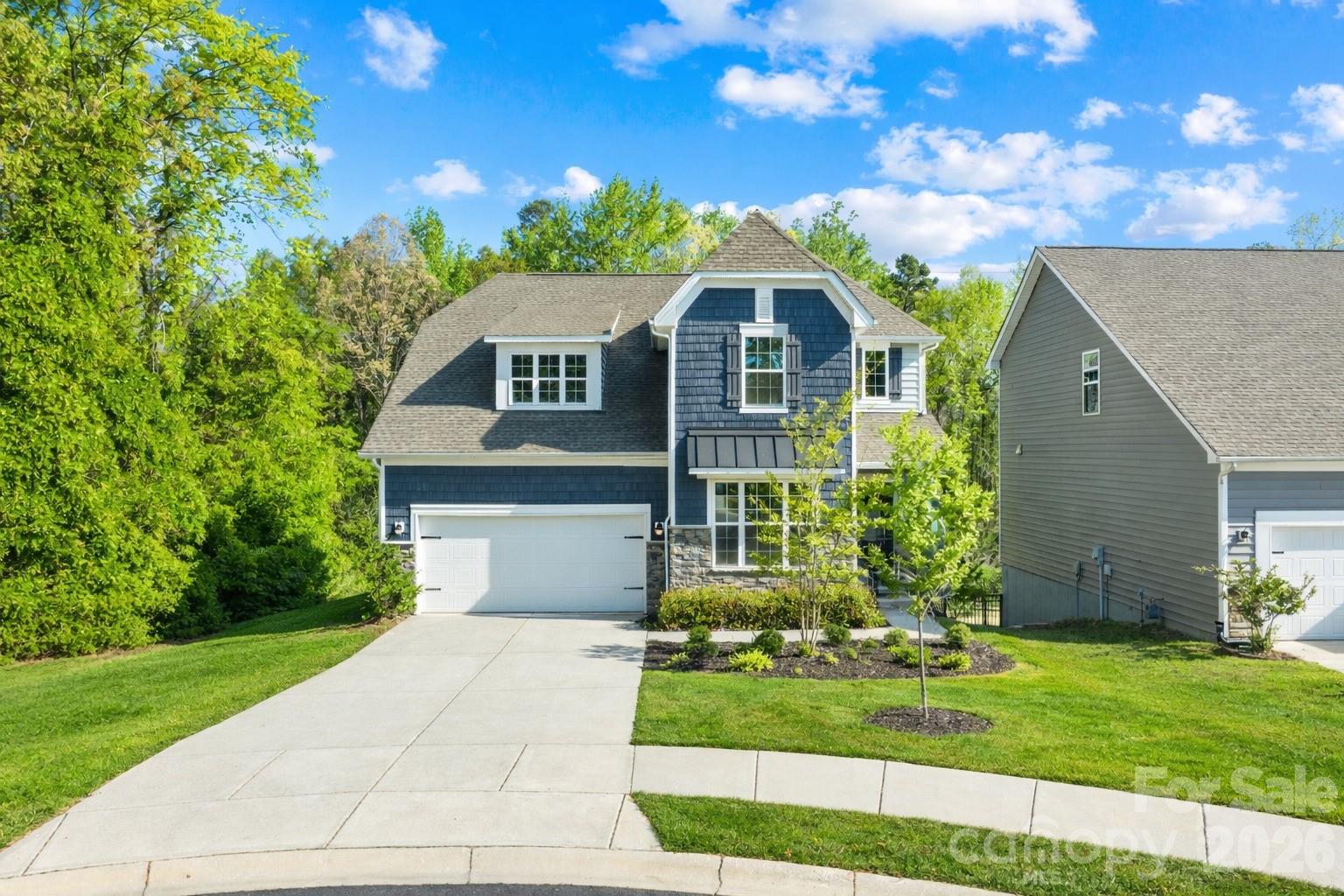 Back on market at no fault of seller! Prior buyers financing fell through. Welcome to 1072 Willow Bend Dr – a beautifully positioned 4-bedroom, 3.5-bath home tucked at the end of a quiet cul-de-sac in the heart of Fort Mill with its own private POOL and HOT TUB! Offering privacy, space, and flexibility, this home features wooded views from the back deck with easy access to I-77 and downtown Fort Mill and tucked right behind Publix. The main level showcases engineered hardwood floors, a dedicated office, and a spacious living area centered around a stone veneer electric fireplace. The kitchen is equipped with gas appliances, a luxury touchscreen stainless steel refrigerator, and flows seamlessly for everyday living and entertaining. A built-in CPI security system adds convenience and peace of mind. Upstairs, the primary suite offers a large walk-in closet, while additional guest bedrooms provide ample space. Laundry is conveniently located on the same level. The partially finished basement is a standout feature—ready for a buyer’s final touches. It already includes a bedroom, full bathroom, and a versatile flex space currently used as a home gym. Step outside to your private backyard retreat with a walk-out patio leading to an in-ground pool and hot tub—perfect for relaxing or entertaining. Complete with a 2-car garage and located in a desirable Fort Mill setting, this home offers the ideal blend of comfort, privacy, and potential. Approx $15k-20k to finish basement and add heated, finished sqft and instant equity to you home.