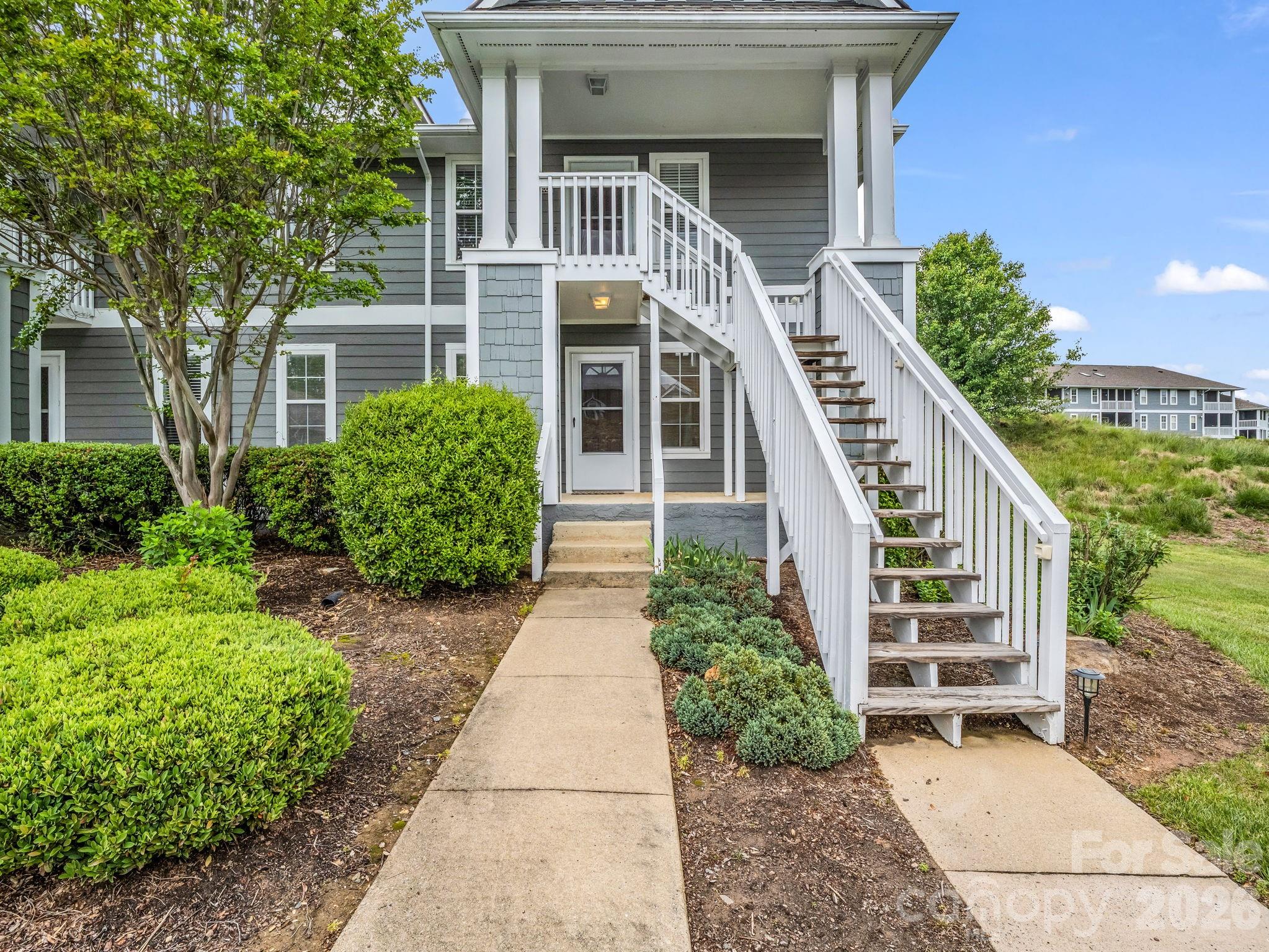 Experience the perfect blend of comfort and convenience in this 2BR/2BA Biltmore Commons retreat. Featuring light filled space and a private screened in porch with serene views, this home offers a premier "lock-and-leave" lifestyle. Enjoy amenities including a heated pool, tennis courts and a fitness area-all within a secure gated community just minutes from downtown Asheville and the Blue Ridge Parkway. This condo is the lowest priced opportunity to join this coveted community. While the home needs some TLC and cosmetic updates, it offers a blank canvas for you to bring your vision to life while hopefully building equity. Bonus - end unit on the ground floor!