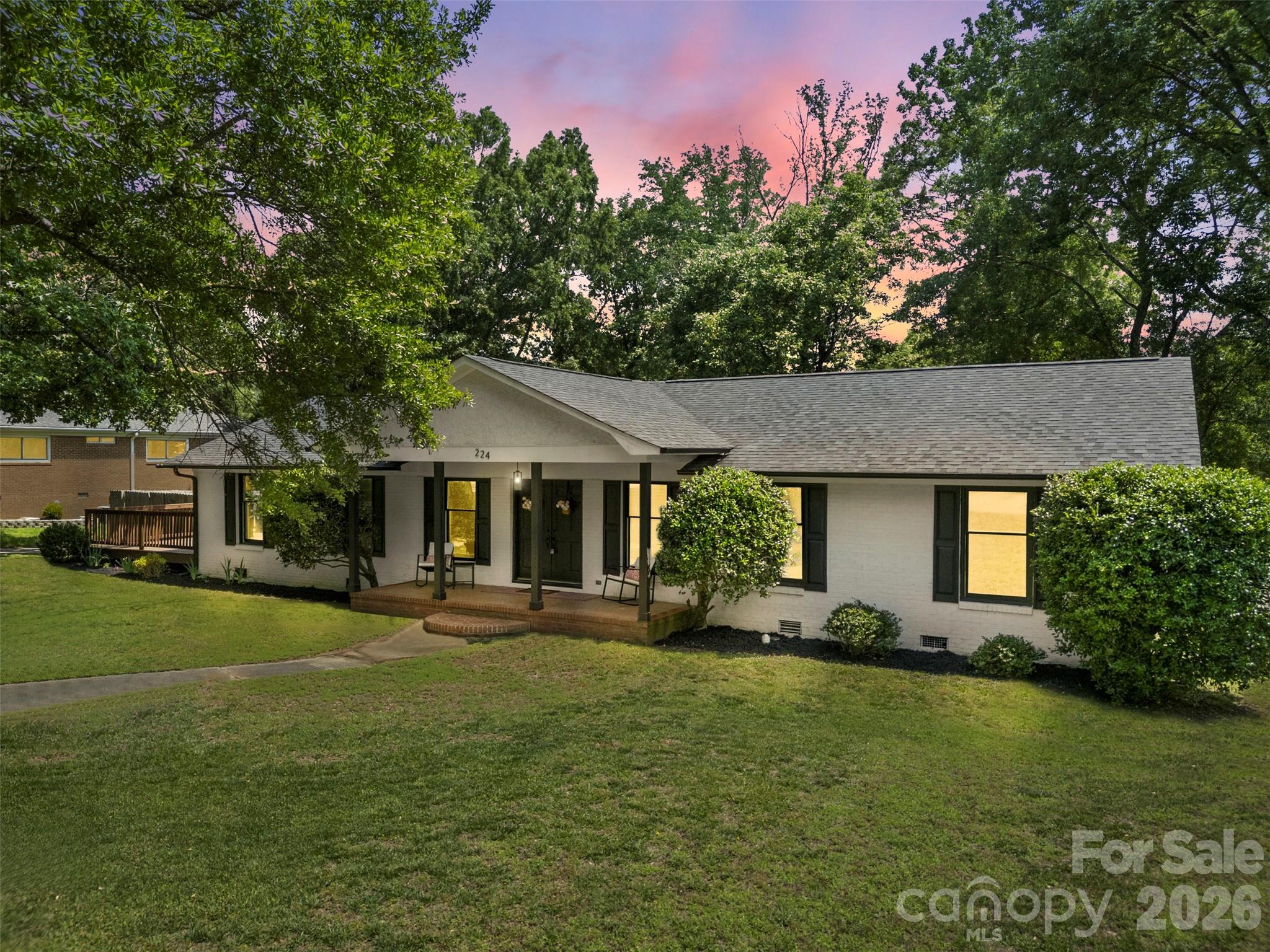 Beautifully remodeled and move-in ready! This charming white brick ranch offers 3 bedrooms, 2 full bathrooms, and sits on nearly half an acre in a convenient Charlotte location. Thoughtfully updated throughout, the home features modern finishes, updated flooring, an updated HVAC system, plumbing, water heater, roof, gutters, and appliances. Inside, you'll find a bright and functional layout that is ready for its next owner to enjoy. One of the standout features of this home is the large, fully fenced backyard, offering plenty of privacy and space for entertaining, pets, gardening, or relaxing outdoors. Located 15 minutes from Charlotte Douglas International Airport and Uptown Charlotte, this home provides easy access to shopping, dining, and major commuter routes while still offering plenty of room to spread out. Don't miss your opportunity to own this beautifully updated home at 224 Sturbridge Drive!