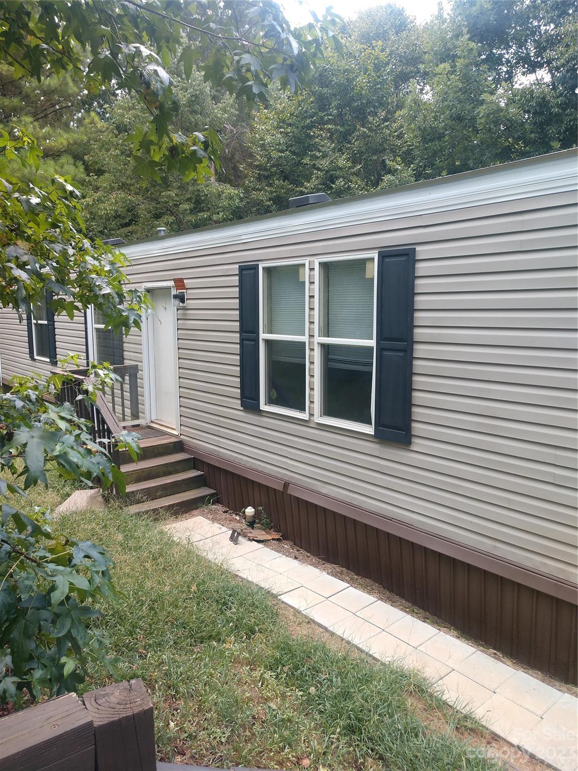 Welcome to peaceful Serenity Lane! This 3-bedroom, 2-bathroom home is one of Clayton Homes most popular floor plans. Situated on just over an acre lot on a cut-de-sac with no HOA. The wooded backyard provides the perfect setting to enjoy your own oasis with a fantastic location.