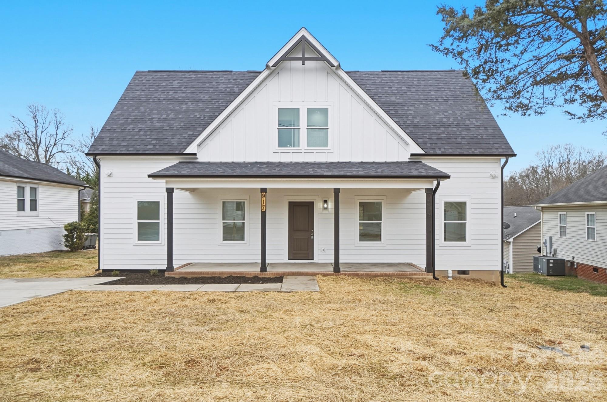 New Construction 4 Bedroom, 2.5 Bathroom Home with Primary Suite on Main Floor – No HOA – Minutes from Downtown Kannapolis.
Welcome to this beautifully designed two-story home offering modern finishes and an open-concept layout ideal for everyday living and entertaining. The main level features a spacious living room with recessed lighting, waterproof laminated wood flooring, and a stylish shiplap fireplace that adds warmth and character.
The kitchen is the heart of the home, complete with an oversized granite island, stainless steel appliances, abundant cabinetry, and ample prep space,  perfect for meal preparation and gatherings.
The primary bedroom is conveniently located on the first floor, offering privacy and comfort with an accent wall, dual vanities, and a walk-in shower.
Upstairs, you will find three spacious bedrooms and a full bathroom.
Exterior features include a covered front porch, a modern rear deck ideal for outdoor entertaining, a generous yard, and a wide concrete driveway providing ample off-street parking. Enjoy the flexibility of no HOA while being conveniently located near downtown Kannapolis, Atrium Health Ballpark, restaurants, coffee shops, parks, shopping, and major commuter routes.