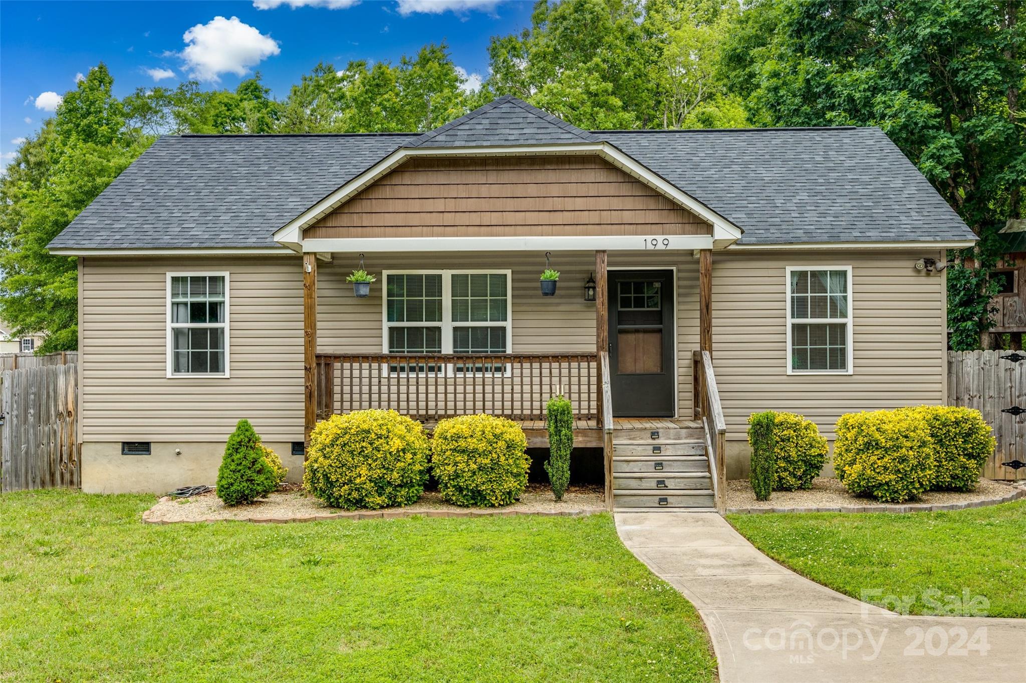 Check out this adorable ranch home in the Clover School District. 3bed/2bath, open floor plan with a large back yard with privacy fence. Stainless steel appliances and granite countertops! Enjoy those Carolina evenings on your covered, rocking chair front porch. Sellers are offering a 5K flooring/paint concession. Don't wait to make this home yours!