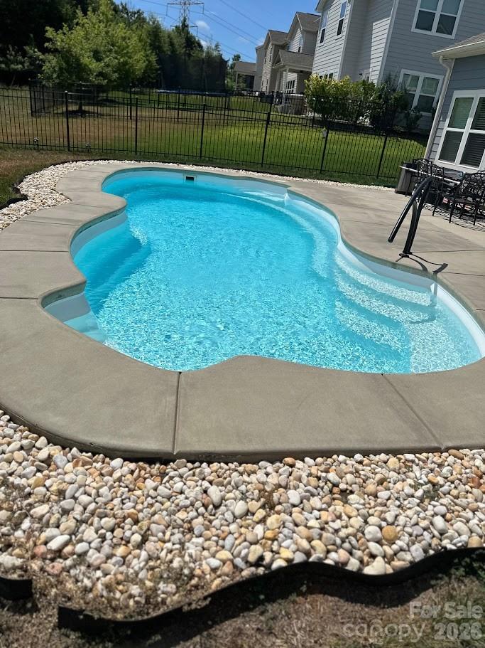 HOT HOT HOT!!! PRIVATE POOL  with a NEW POOL PUMP and GATED COMMUNIY. This is A MUST SEE INSIDE Fabulous Semi- Custom home has  a private inground with new water pump   4 HUGE Bedrooms, 3-full Baths —including optional  2nd primary suite upstairs—this residence offers space, style, and comfort and located in The GATED Manor at Handsmills– Lake Wylie

The open floor plan showcases a gourmet kitchen with a large granite island, generous counter space, soft closed doors and premium finishes. The main-level primary suite includes a spacious sitting room, a designer bathroom with separate shower and garden tub, and a custom walk-in closet.

Enjoy year-round relaxation in the sunroom, which opens to a fenced backyard with a new in-ground pool, expanded patio, and plenty of room for entertaining.

Community amenities include a playground, walking trails, clubhouse, fitness center, lake-view pool, leased boat slips, and RV/boat storage.

Ask about potential lender credit—up to $2,500!