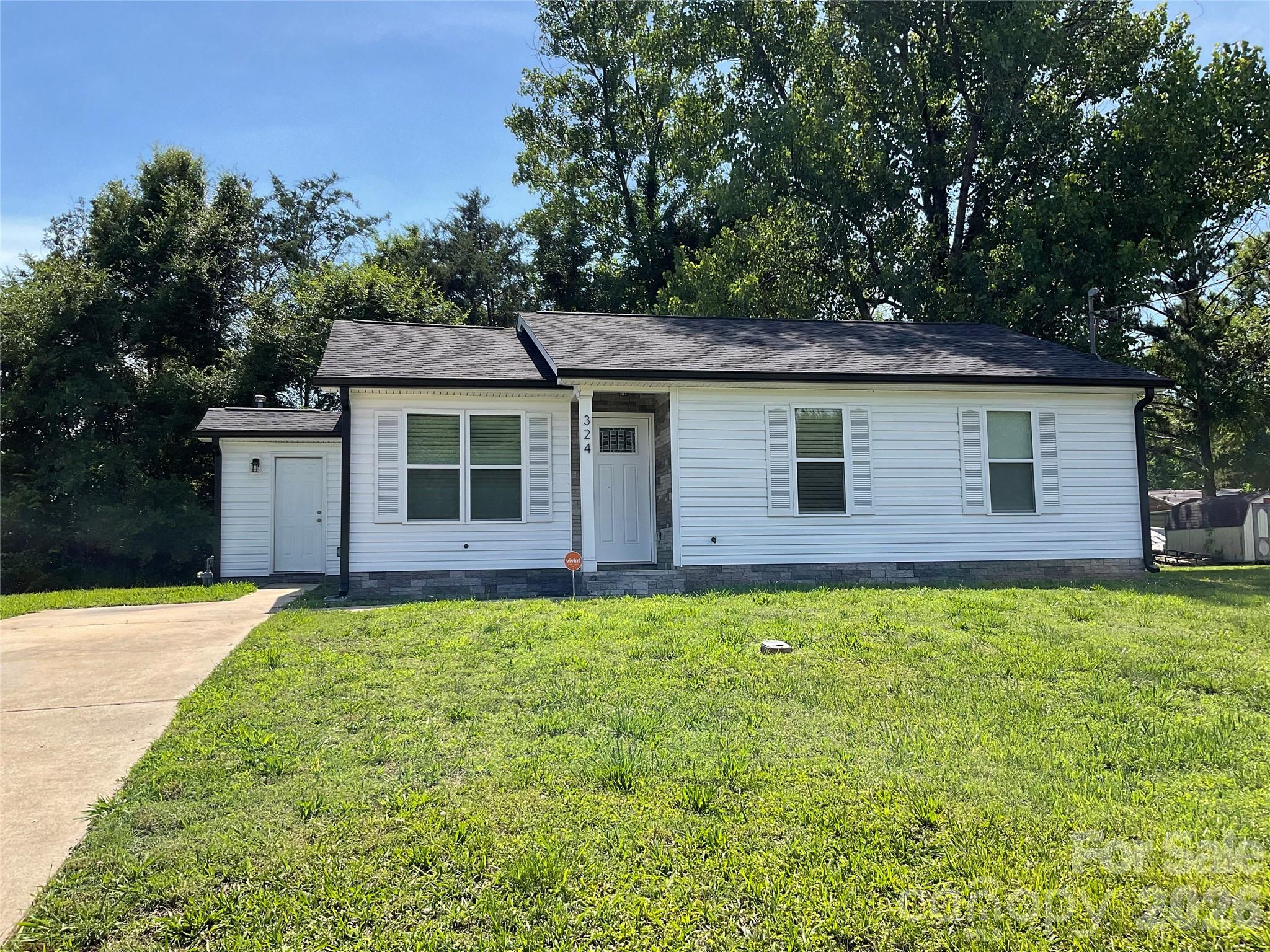 Welcome home to this beautifully renovated 3-bedroom, 1.5-bath residence in the heart of Rock Hill! With 1,013 square feet of thoughtfully updated living space, this move-in ready home combines modern upgrades with everyday comfort.

Major improvements have already been completed for you, including a brand-new roof, new HVAC system, new siding, and stylish new black gutters and trim that create exceptional curb appeal. Inside, you'll find a fully updated interior featuring fresh finishes, modern fixtures, and a bright, welcoming floor plan.

The primary bedroom offers the convenience of a private half bath, while two additional bedrooms provide flexibility for guests, a home office, or hobbies. The updated kitchen and living spaces are designed for easy living and entertaining. The Mud/Laundry Room is conveniently located off the kitchen.

Best of all, there is NO HOA, giving you the freedom to enjoy your property without additional restrictions or monthly fees.

Conveniently located near shopping, dining, schools, and major commuter routes, this turnkey home is an excellent opportunity for first-time buyers, downsizers, or investors seeking a low-maintenance property with major system upgrades already completed.

Schedule your showing today and experience all that this beautifully refreshed Rock Hill home has to offer!