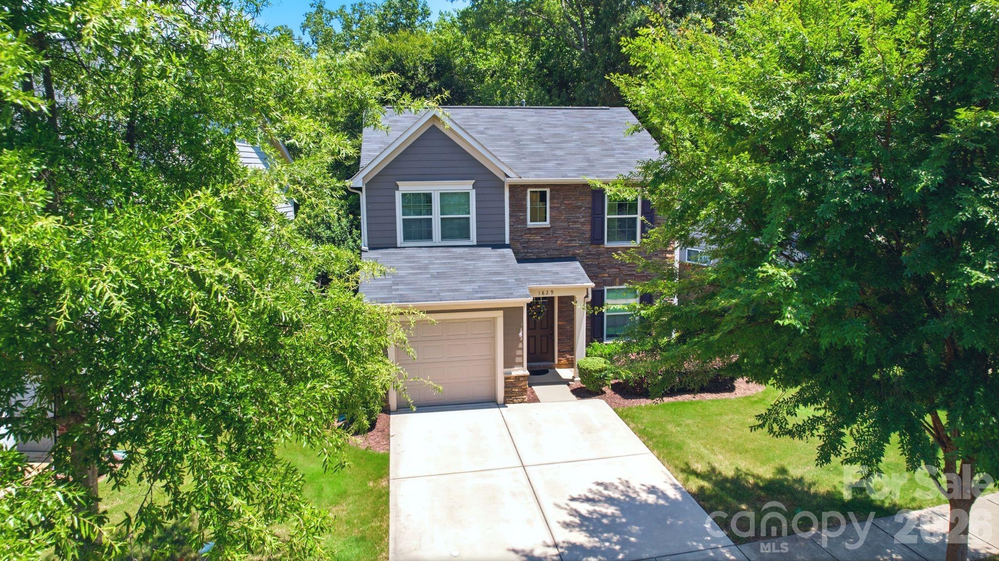 Single family opportunity in a great neighborhood! Charming and move-in ready, this 3BD/2.5BA home sits just one mile from Bank of America Stadium — an unbeatable location near Uptown Charlotte. The beautifully updated kitchen features dark cabinetry, stainless steel appliances, and granite countertops, flowing seamlessly into a bright, open downstairs finished with pre-engineered wood flooring throughout.

Upstairs, the spacious master suite offers a dual-sink vanity and a generous walk-in closet, with two additional bedrooms providing flexibility for family, guests, or a home office. The yard offers private outdoor space, and the attached one-car garage adds everyday convenience.

Don’t miss this opportunity to own a low-maintenance home in one of Charlotte’s most connected locations — close to Uptown, the stadium, and major commuter routes.