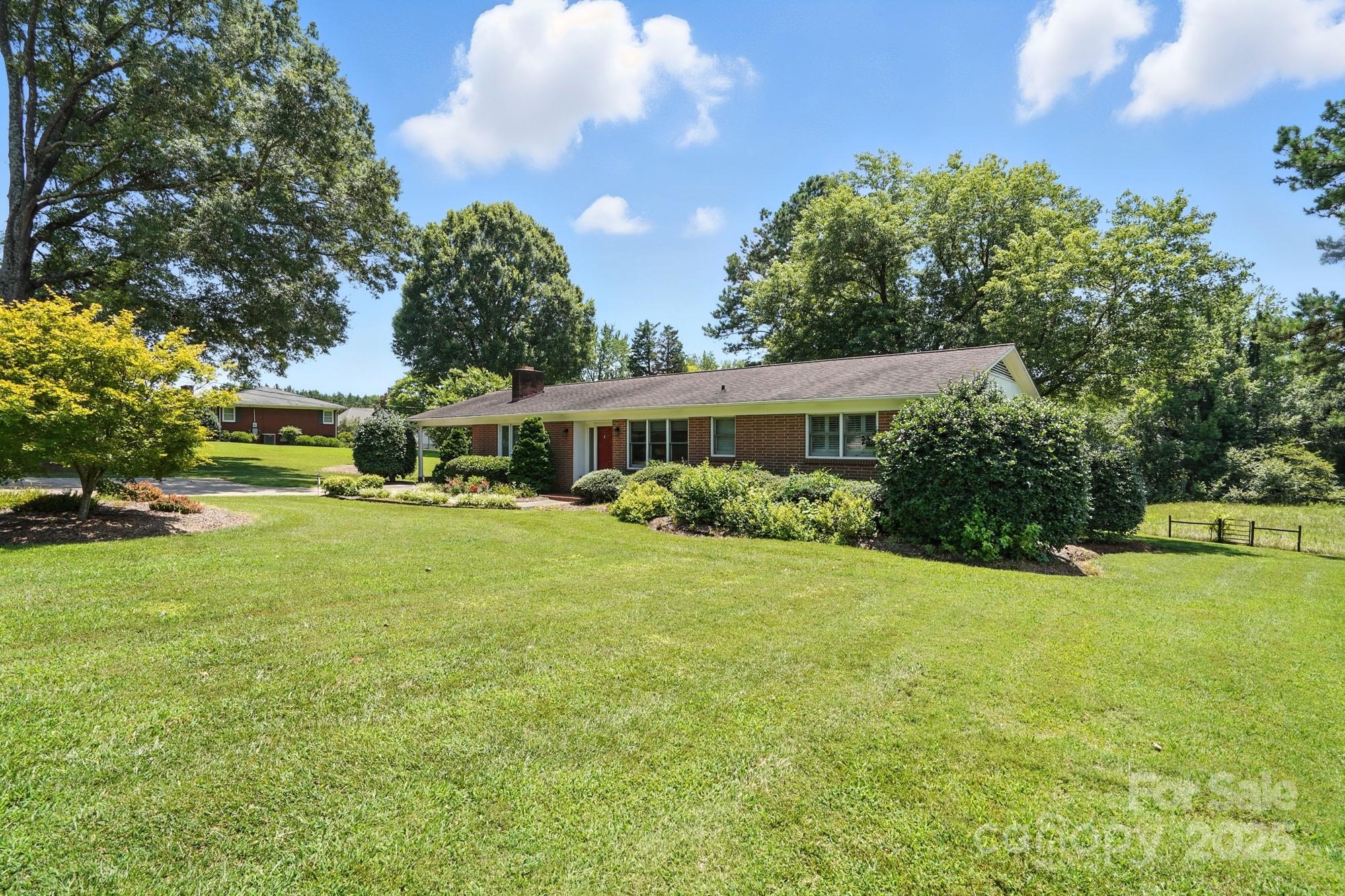 In the heart of Denver, this 3.5-acre property offers endless possibilities! Featuring approximately 1,898 sq. ft. of living space, this home combines residential charm with commercial potential. With over 180 feet of road frontage on NC 16 Business, the visibility is ideal for a future business location, office, or investment opportunity. The property’s generous acreage provides room to expand while maintaining privacy. Just minutes from dining, shopping, and beautiful Lake Norman, this prime location offers convenience and flexibility in a rapidly growing area. Whether you’re looking for a unique home, or a strategic commercial site, this property delivers.