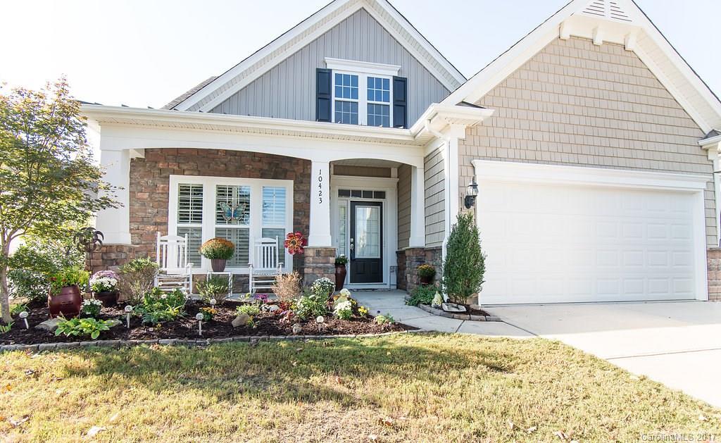 Welcome Home to this stunning Bayview model with rocking chair front porch. Very private backyard with Pennsylvania Blue Stone paver patio with retractable awning and water fountain feature. Kitchen features granite countertops and large island. Open floor plan with two story great room. Plantation shutters on all the windows, crown molding throughout, trey ceilings in dining room and master bedroom. Spacious bonus room upstairs and the custom cedar walls in upstairs bathroom are a must see.
