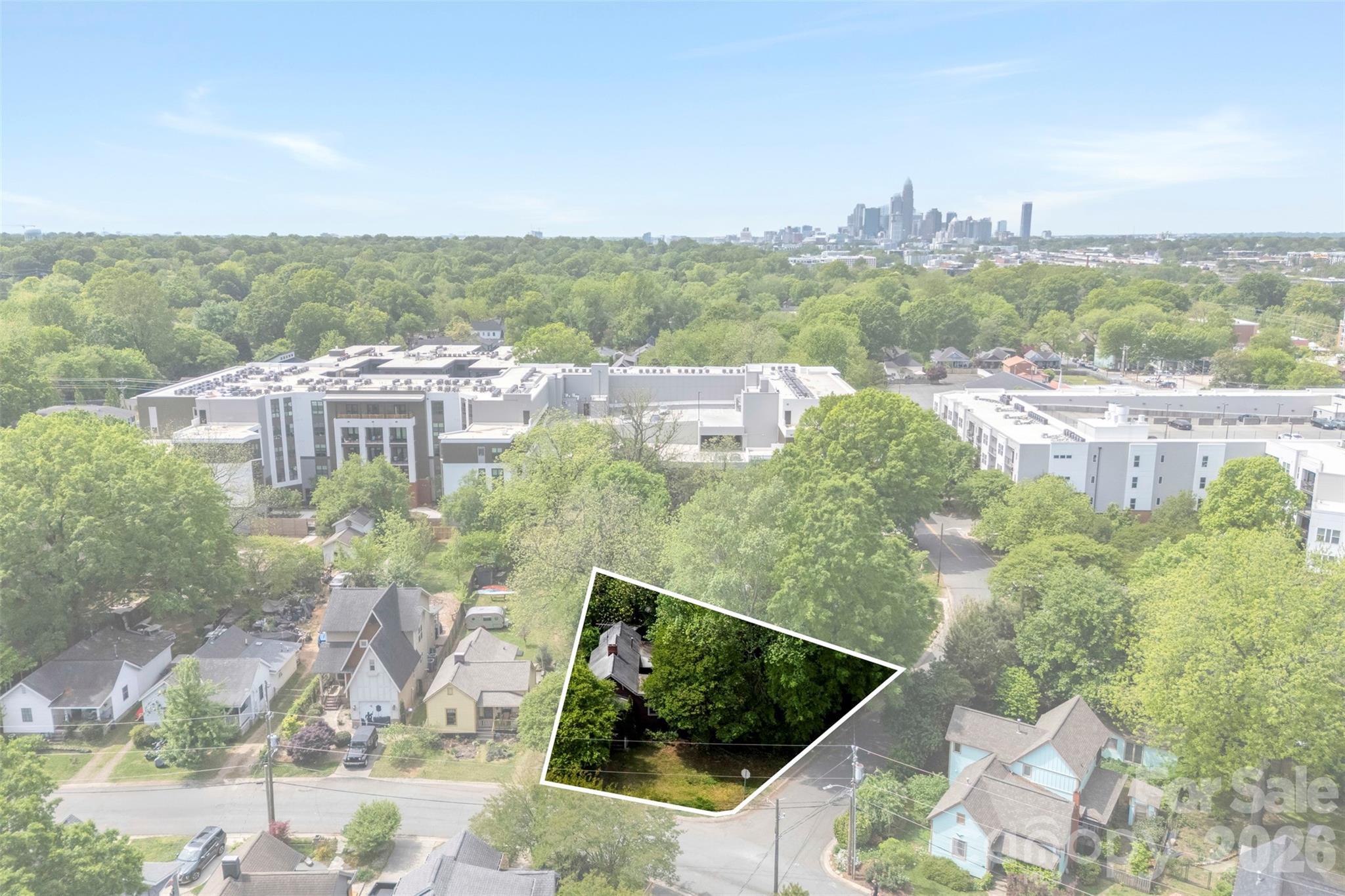 Prime opportunity in the highly desirable Arts District of Charlotte. Situated on a corner lot at 700 E 37th Street, this property offers exceptional potential with value primarily in the land. Located within a City-designated opportunity area supporting ongoing growth and development. Existing home to be sold as-is, with no repairs to be made by seller. Unbeatable location just one block from North Davidson Street and in close proximity to some of Charlotte’s most sought-after neighborhoods, including NoDa, Plaza Midwood, and Villa Heights. Conveniently located just minutes from Uptown and near the LYNX Blue Line for easy commuting.
Enjoy walkable access to popular local destinations such as Local Loaf, Haberdish, Salud and a variety of nearby cafes, breweries, and shops. Close to everyday essentials including Whole Foods Market, Sprouts Farmers Market, , and Harris Teeter, as well as a nearby YMCA.
Don’t miss this rare opportunity to build your dream home in a vibrant, walkable community with easy access to light rail transit, dining, shopping, and entertainment.