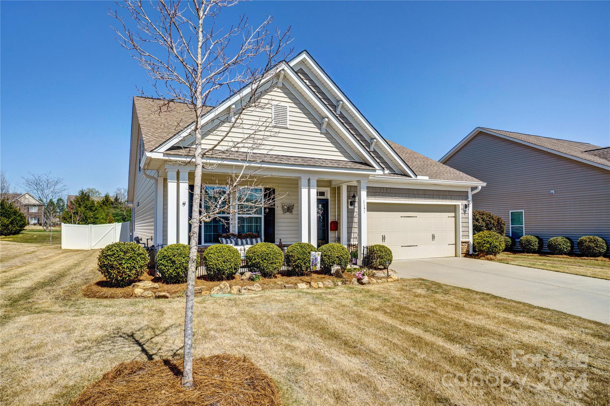 Discover unparalleled living in Timberlake, a serene community in Lake Wylie renowned for it’s award winning school district with close proximity to the airport & major highways. This stunning home combines comfort, style and convenience, catering to those desiring a refined lifestyle. Step inside this beautiful home & you'll find a spacious open layout that combines the living, dining & kitchen areas into one welcoming, functional space. The design smartly lets in lots of natural light, creating a bright & cozy atmosphere perfect for daily life and hosting big gatherings. The kitchen, the centerpiece of the home, is a chef's dream with granite countertops, a gas stove, SS appliances & plenty of counter space, perfect for cooking and socializing. The main level primary bedroom offers a quiet retreat. Enjoy the outdoors in the sunroom, a peaceful spot to admire nature. The private backyard oasis has a beautiful patio, hot tub & privacy fence, ideal for relaxing or hosting gatherings.
