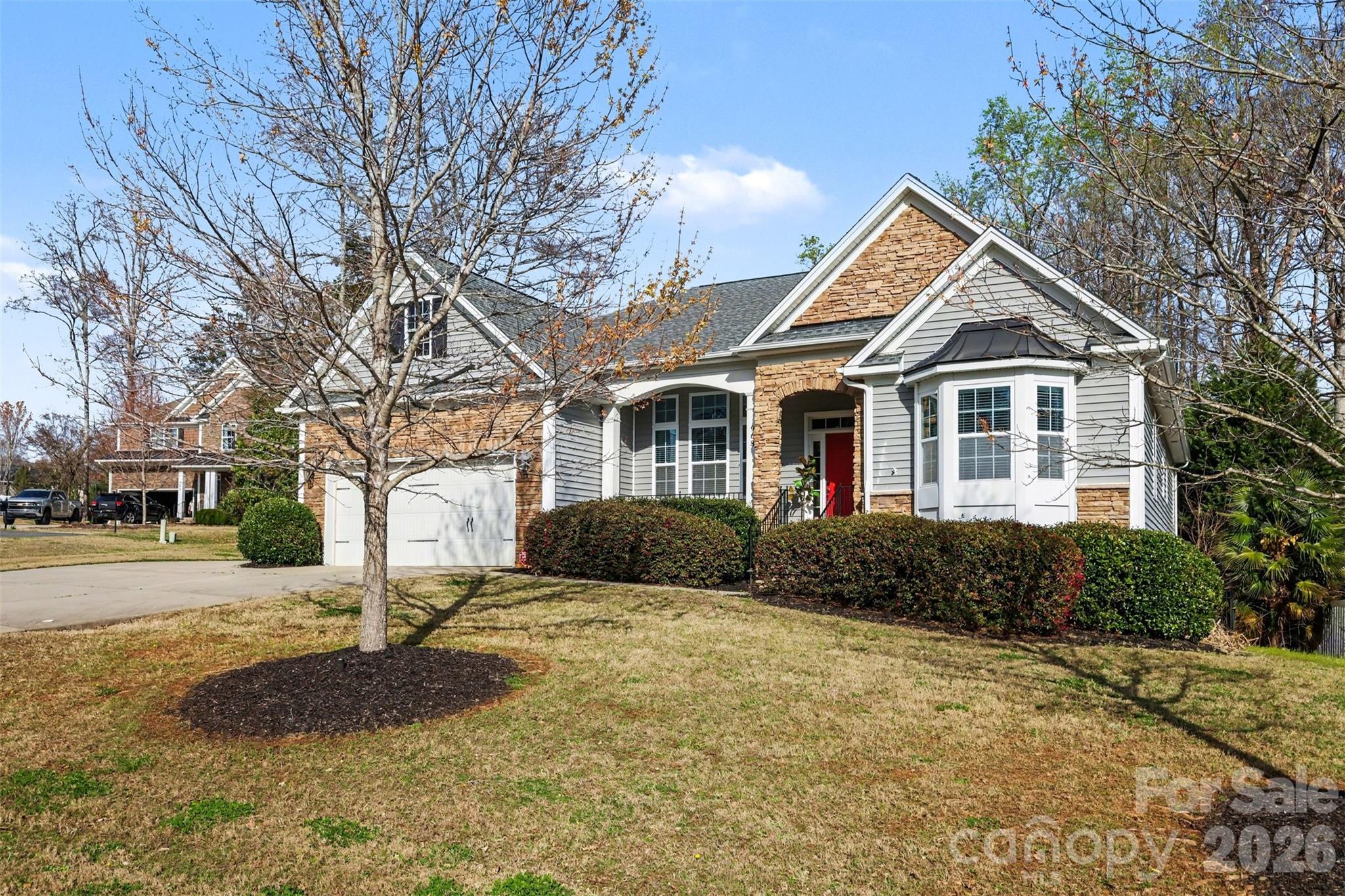 Bright, open, and designed for easy one-level living, this home features a functional floor plan with vaulted ceilings , wood flooring throughout the main living spaces, and a wall of windows that fills the home with natural light while showcasing the private backyard. A separate office with French doors provides the perfect work-from-home space.
Step outside to your own backyard retreat with a screened-in porch overlooking a private, tree-lined yard, complete with fencing and an in-ground pool—ideal for relaxing or entertaining.
Tucked away on a quiet cul-de-sac, this home offers peaceful living with everyday conveniences close by—just 1 mile to Starbucks and Chipotle and 4 miles to the Buster Boyd Bridge and Lake Wylie access—and is located within highly rated schools. Comfortable, functional living in a location that makes life easy.