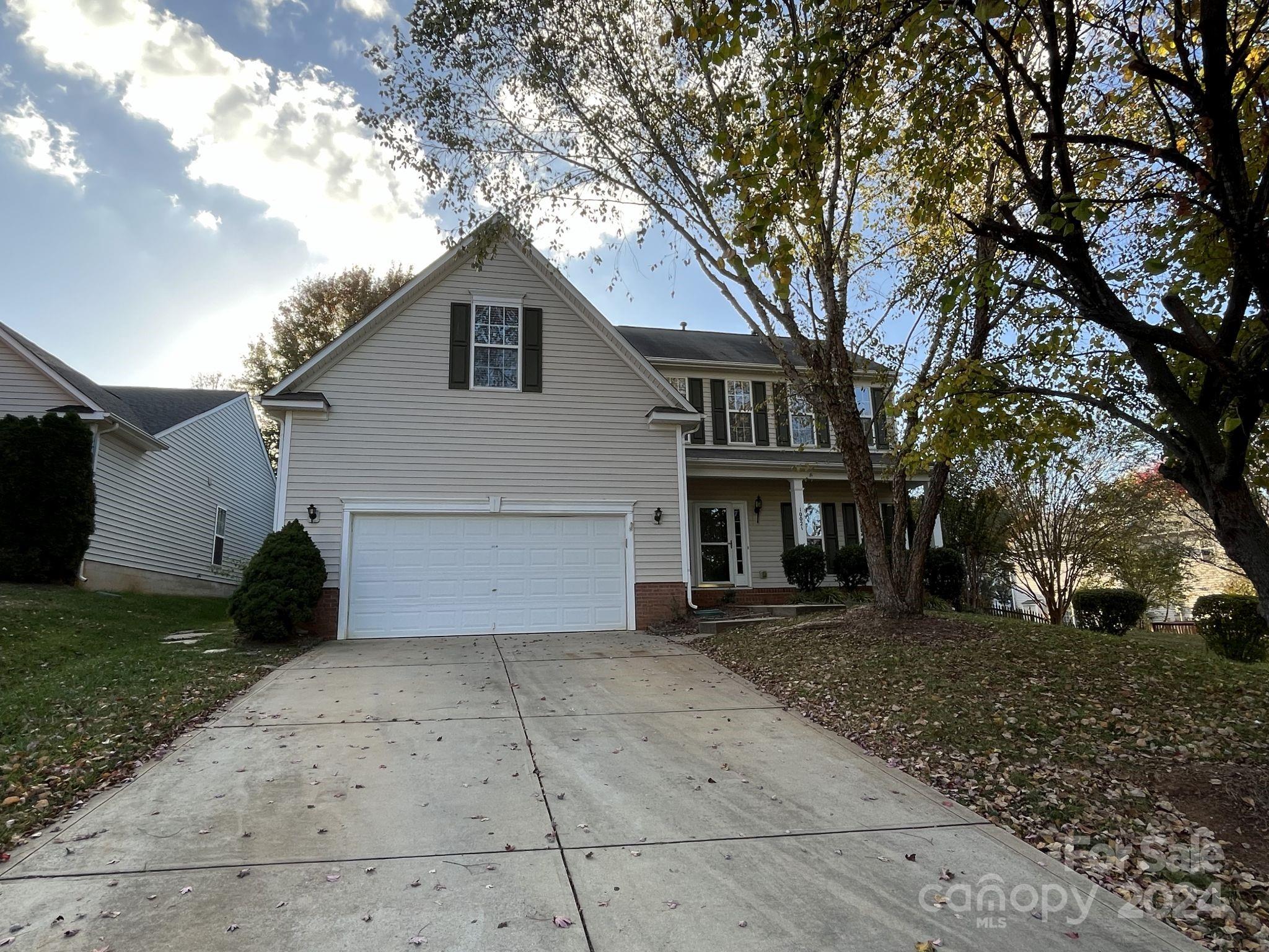 Wow!  Check out this 2 story refreshed 4 Bedroom home in Spring Park.  This home features 4 bedrooms, sunroom, loft, 2.5 bathrooms and nearly 2700 square feet of living space.  Main floor has a formal dining room, half bath and beautifully updated kitchen with brand new 42" cabinets, quartz counters and stainless steel appliances.  Open 2 story living room with fireplace, breakfast area and sunroom.  Primary bedroom on the main level with walk in closet and private full bath with dual vanity and separate tub/shower.  Upstairs has 3 good size bedrooms, full bath and small loft area overlooking living room.  Luxury vinyl flooring throughout the main level, carpet on stairs and upstairs.  Covered back patio and fenced back yard with storage shed.  This home is located in Spring Park just off Hucks Rd. near Old Statesville Rd.  Easy access to I-485 and short drive to Concord Mills, Huntersville or Uptown Charlotte.  Don't miss this one!