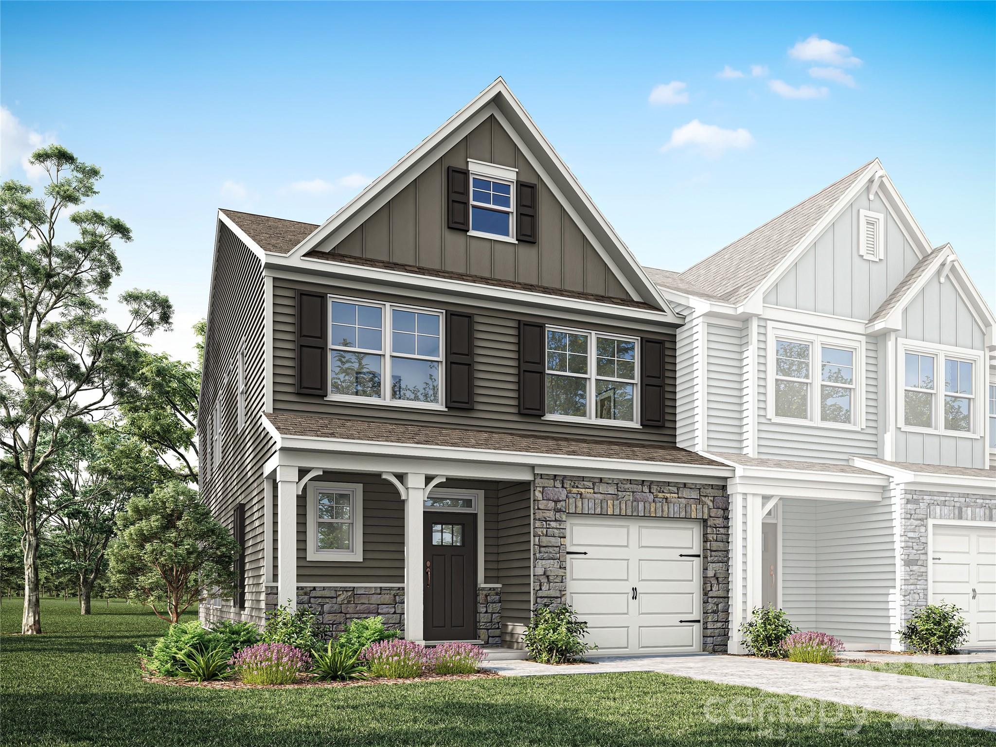 Welcome to Downtown Waxhaw's newest townhomes! This end-unit townhome features the Cary floorplan with 3 bedrooms, 2.5 baths, and an attached 1-car garage. The two-story family room features a ceiling fan, and the room offers lots of natural light. The kitchen has Shaker-style, white soft close cabinets, quartz counters, tile backsplash, and stainless appliances. Beautiful and durable Enhanced Vinyl Plank flooring runs throughout the main level, and composite stair treads are included. All baths feature white cabinets and quartz counters. The primary suite, located on the main floor, includes a large walk-in closet, and the primary bath features a tiled shower with semi-frameless enclosure and a double-sink vanity. The upper floor features two additional bedrooms, a loft overlooking the family room, a full bath with tub/shower combo, and a large, finished bonus/flex/storage area. Other extras include a tray ceiling in the foyer & primary bedroom. Enjoy the outdoors on your covered rear porch!