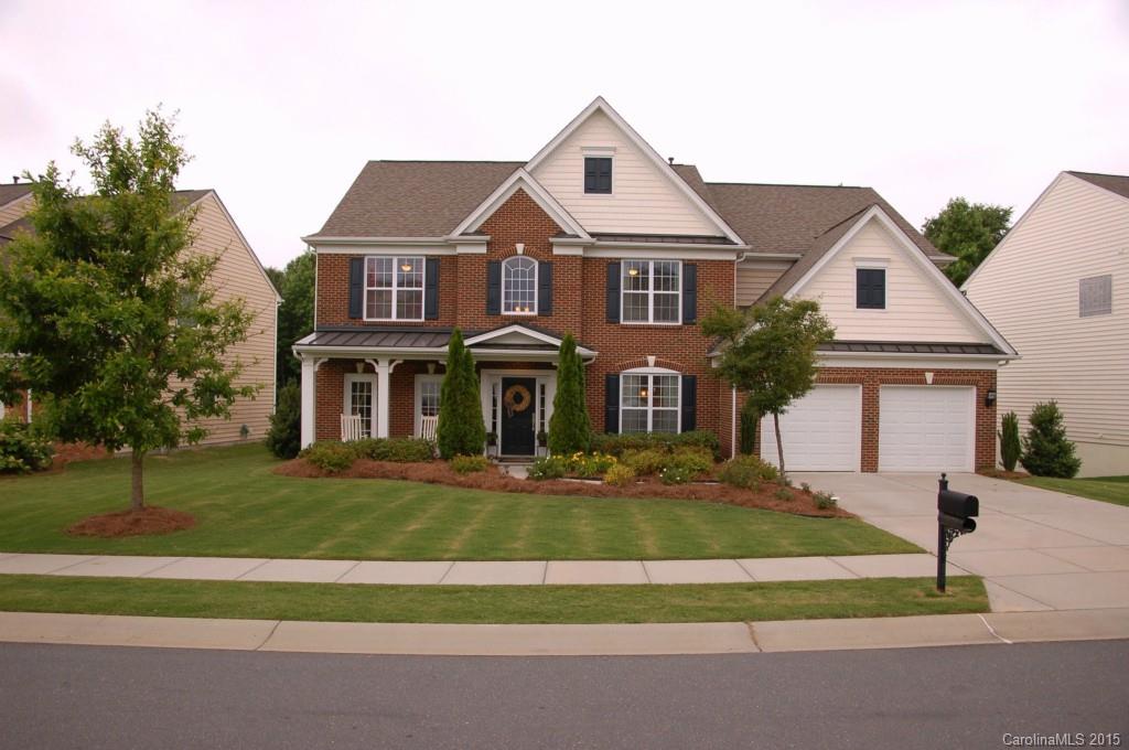 Gorgeous home in desirable BelAir at Carolina Lakes with brick front, two story great room featuring custom draperies, gourmet kitchen with granite counter-tops, home office with French doors, trey ceiling in master, sitting area adjoins master bedroom. Enjoy entertaining on the back deck with pergola and fenced yard. Home backs up to trees for privacy. Priced below tax value!!!