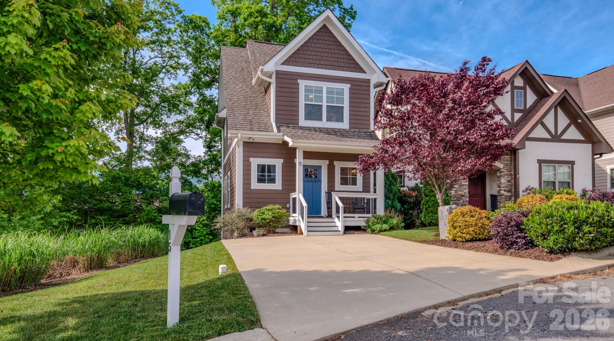 Step into pure perfection with this immaculate, 2019-built home in Tudor Croft—one of Black Mountain’s most coveted communities. Seamlessly blending modern elegance with lock-and-leave convenience, this turnkey residence looks and feels like a brand-new model home. The sun-drenched interior features a thoughtful layout that maximizes every square foot, centered around a cozy gas fireplace perfect for chilly mountain evenings. Outdoor living is a true highlight: sip morning coffee on your charming front porch, or unwind on the covered back deck to take in the serene mountain vistas. Location is everything. You are just minutes from the fairways of the Black Mountain Golf Course, the tranquil waters of Lake Tomahawk, and the vibrant dining, shopping, and culture of downtown Black Mountain. Whether you are seeking a sophisticated primary residence, a peaceful mountain getaway, or a lucrative short-term rental investment, this low-maintenance gem is a rare find. Schedule your tour today and experience easy mountain living at its finest.