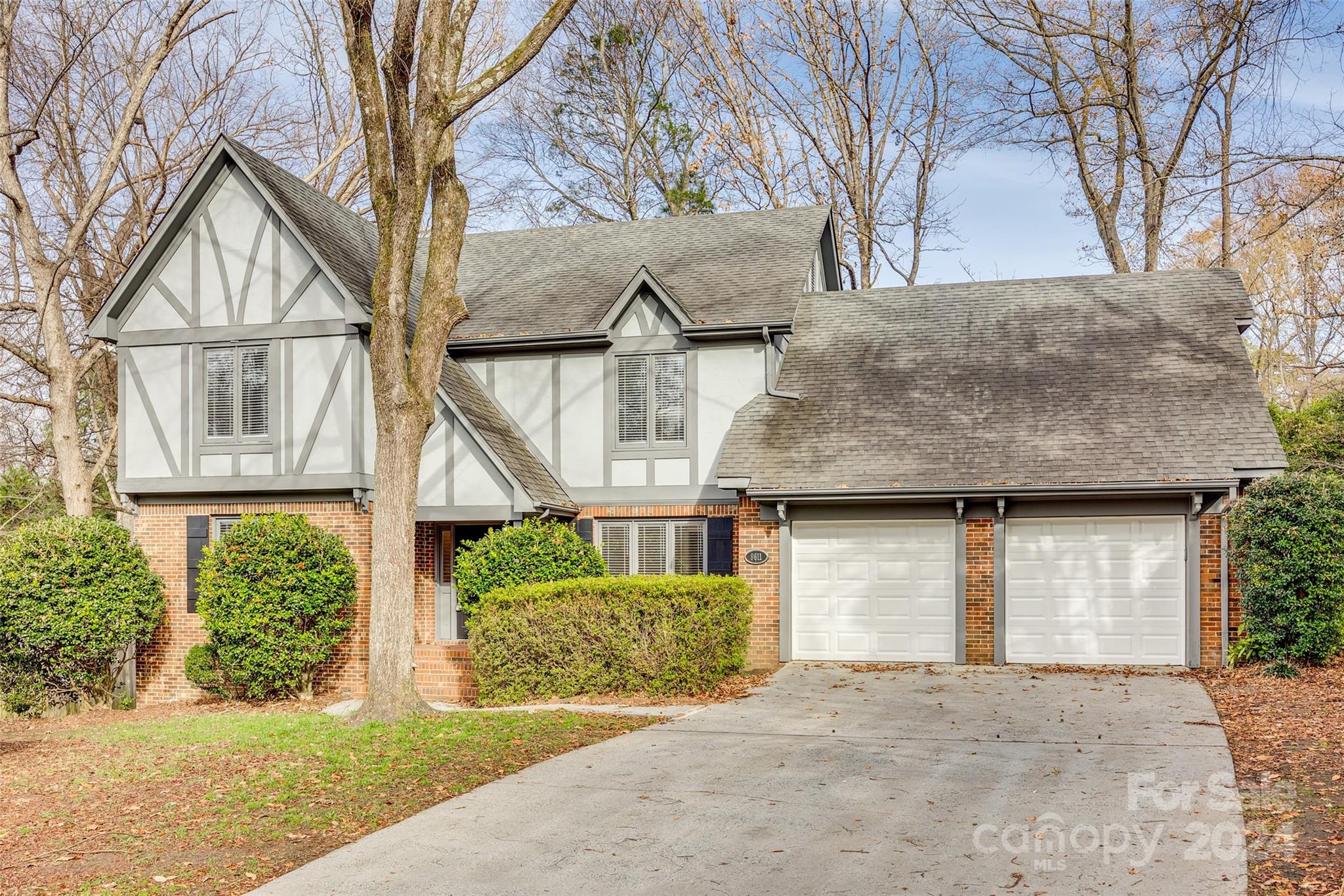 Beautiful Tudor style home on private cul-de-sac. Large, open floorplan. This home says welcome and is ready for the new owner. Great room is open to kitchen w/SS appliances, Paint is neutral. Lots of closets & extra attic storage! Upstairs has huge master suite with spacious sitting room! Bonus room could be used for anything you need including a bedroom. Large rear deck overlooks private beautiful, serene backyard.