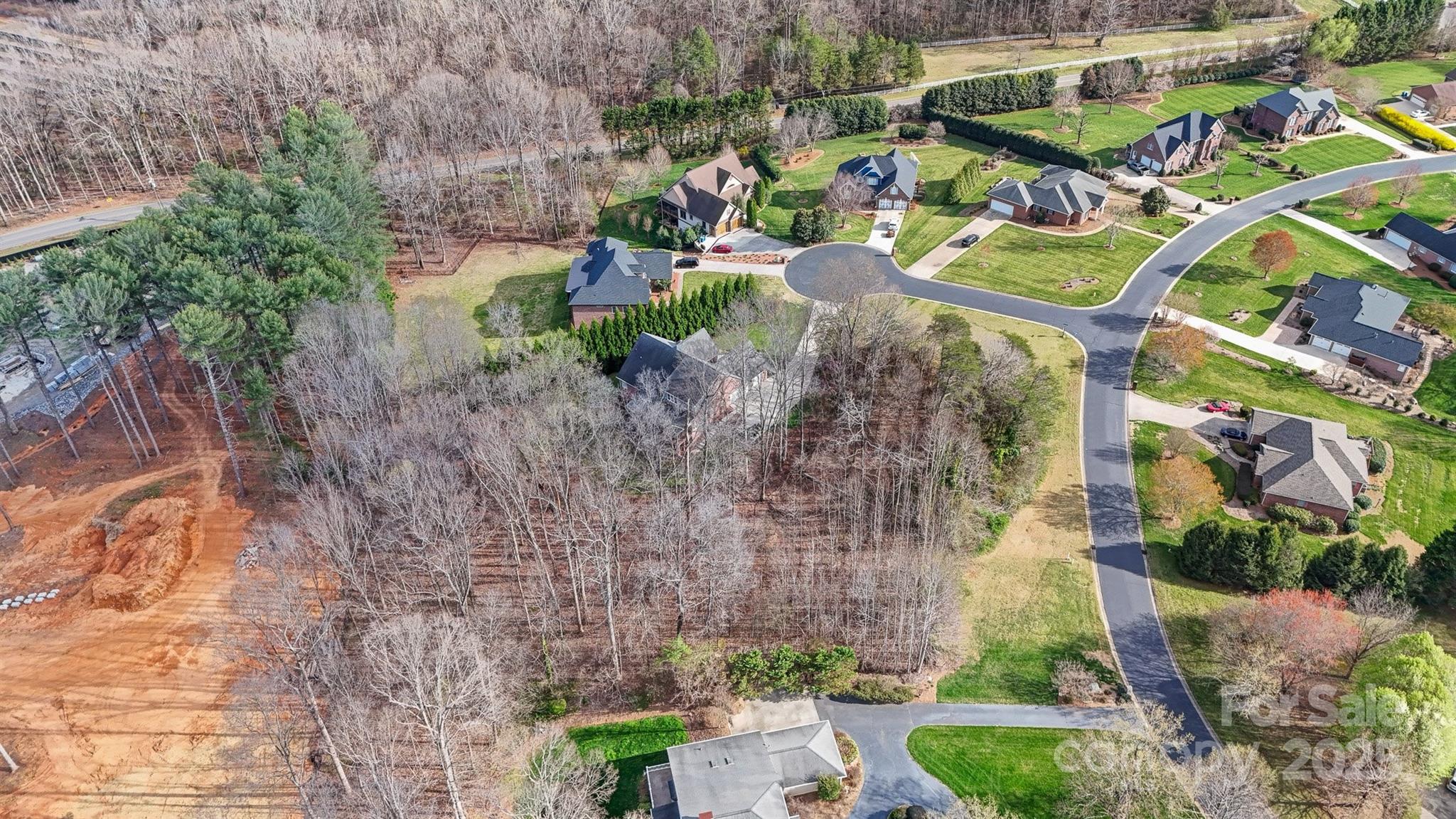 Exclusive 1.01 Acre Lot in Prestigious Rock Barn Country Club & Spa! Seize the opportunity to build your custom dream home in his established, highly desirable community that offers the perfect balance of luxury and convenience. This expansive 1.01-acre parcel provides the perfect setting for a custom home tailored to your vision. With an optional Rock Barn membership you can enjoy access to world-class amenities, including top-rated golf courses, a high-end spa, tennis & pickleball courts, a state-of-the-art fitness center, an Olympic sized outdoor pool and both casual & fine dining options. Within minutes to I-40, Hwy 16 & Hwy 70. Another unique feature this lot provides, is the rare opportunity to purchase the adjacent lot! Adding additional space & privacy to your future homesite! See MLS #4316615