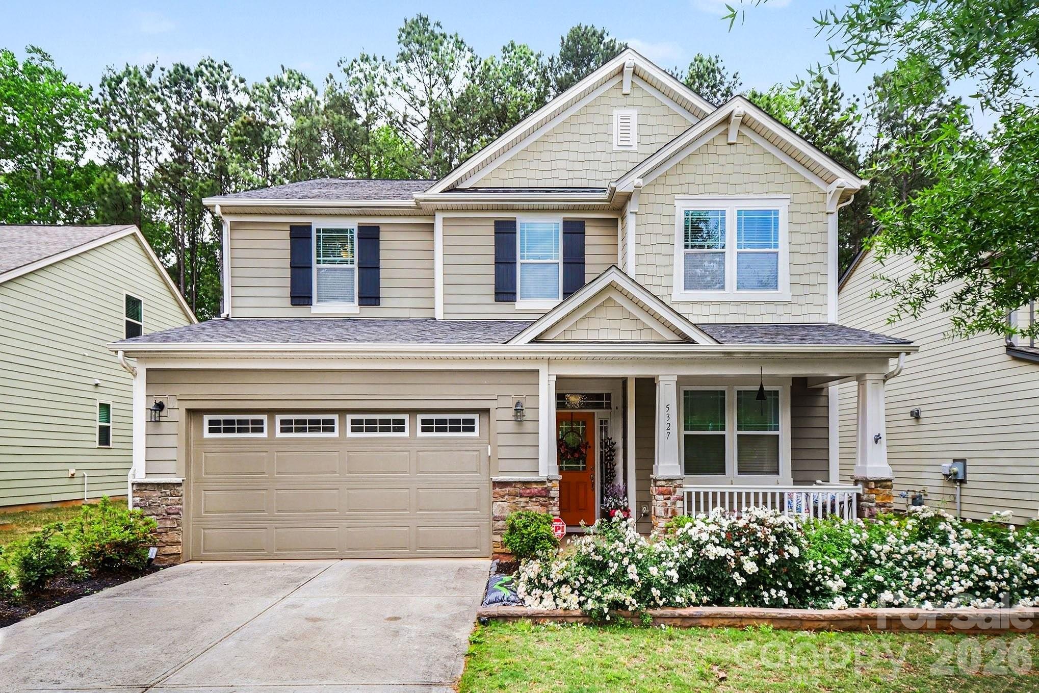 Beautifully maintained 4BR/ 4BA home in the sought-after Lake Crest community, conveniently located just minutes from Lake Wylie. The main level boasts a flexible study or playroom and an open-concept kitchen with island and breakfast bar that flows into the spacious living room with gas fireplace and office nook— great living and entertaining. A two-car garage, half bath, and full guest room including full bath complete the first floor. The home features 9-foot ceilings throughout, generous storage, and a well-appointed primary suite with double vanity, 2 oversized walk-in closets, separate shower, jacuzzi tub, and private water closet. Upstairs you’ll find a large loft-style living or rec area, three bedrooms, two full baths, and a dedicated laundry room with plenty of space. The home backs up to a serene forest setting with a fully finished brick and patio and large hot tub that conveys!