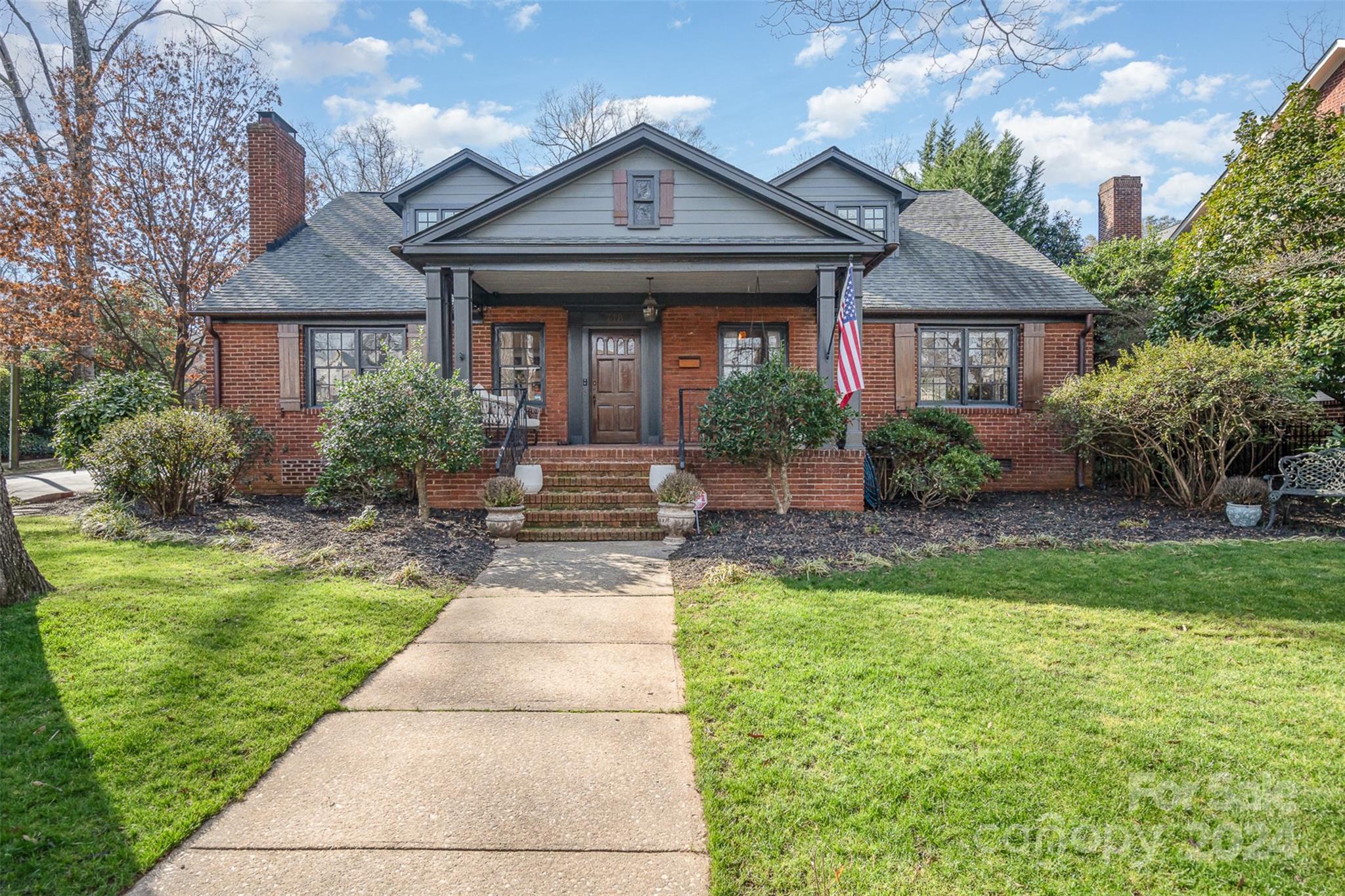 If you've been waiting for the perfect Dilworth Historic District home, you have found the one!  Originally the home to Charles Moretz of Charlotte staple Moretz Coal & Ice Co., this home was featured on the 2008 Dilworth Home Tour after extensive renovations.  Perfectly situated on a large corner lot less than one mile from Uptown Charlotte with full views of the city skyline, this unassuming home now boasts almost 4700sf with 5BRs + office, 5BAs, large, finished basement, original hardwoods throughout main house, whole house generator system and heated tile floors in sunroom & primary bath. The oversized chef's kitchen includes a 12' eat-in island, 48" gas range & pot filler, dual dishwashers, 48" fridge/freezer, cast iron farm sink with marble surround tops, wet bar w/separate sink, wine cooler, and pellet ice maker!  The large owner's suite features high vaulted ceilings, spa bath with vessel tub & marble shower, private WC and spacious walk-in closet!  Tons of storage and space!