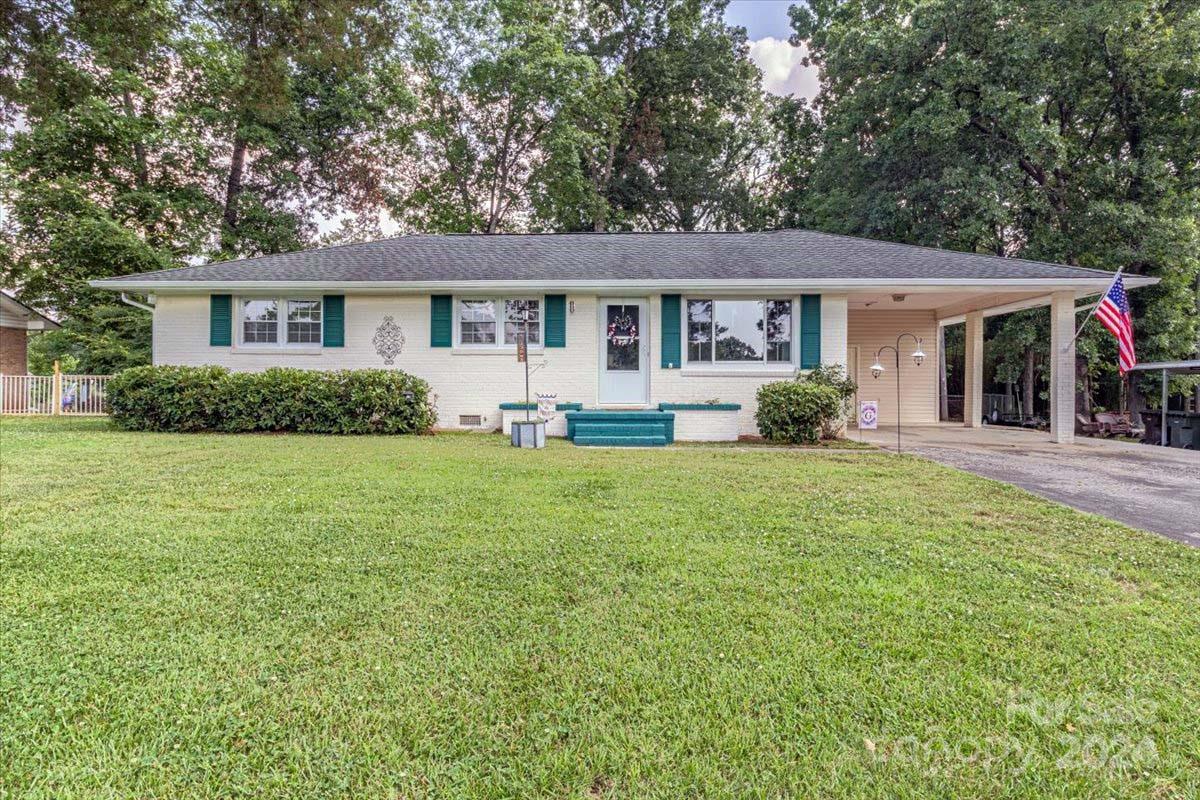 Welcome to 2048 Montclair Drive in Rock Hill's Midbrook Subdivision! This charming brick ranch features 4 bedrooms and 2.5 bathrooms, including a spacious, updated owner's suite with a sitting area and back deck access. The open-concept living, dining, and kitchen area is perfect for family gatherings. Step outside to a large, flat, fenced backyard with a 12,000-gallon 52x24' above-ground pool, ideal for summer fun. The property backs up to Oakwood Acres Park, a 10-acre haven with baseball/softball fields, basketball courts, a playground, and a shelter. Enjoy the freedom of no HOA.