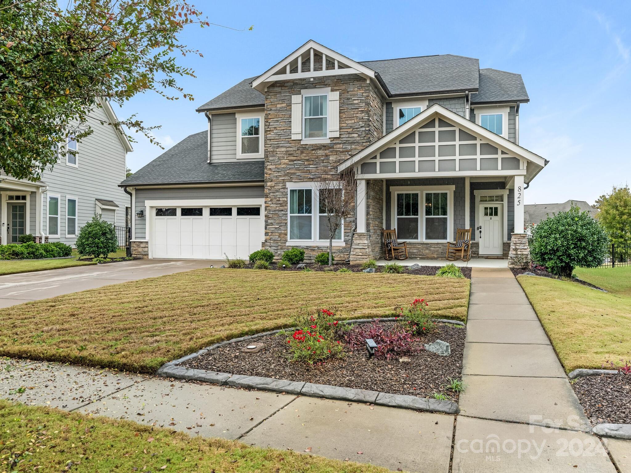 As you enter the home, you'll be immediately struck by the spaciousness and open layout that flows from room to room.  The main living area features high ceilings, allowing natural light to pour in through the large windows creating a bright and airy atmosphere.  The warm tones of the hardwood floors add an element of elegance, while the neutral walls allow you to personalize.  This home features a 1st flr bed/ba, a granite countertop island that offers both convenient prep space and a casual breakfast bar. A generous WI Pantry, an office/work space niche off the kitchen, and an eat-in dining area. Make your way up to the secondary living space where you will find a bonus/flex space, primary bedroom w/sitting room, WI closet, 2 additional beds, and a separate laundry room. Outside has a large backyard & screened in porch w/in-ceiling speaker. Extended 2-car garage suitable for extra storage, to include 3 overhead storage racks. *Pool Table and pool sticks being sold with the house.