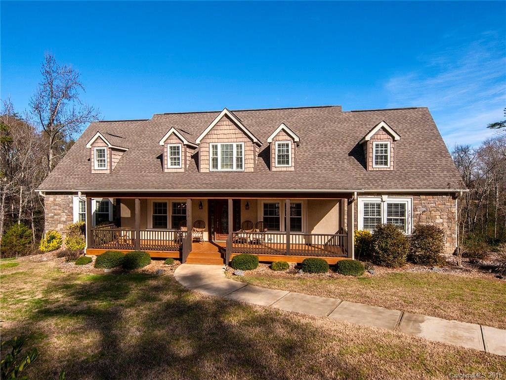 This home on 1.14 acre lot has it all! Open, spacious floor plan features large family room with stone fireplace, formal dining room, chef's kitchen has work island, tons of cabinets, walk-in pantry and sunny breakfast area. Master and guest on main level. Master has tray ceilings and spa-like bath. Third bedroom and bath on upper level with HUGE bonus room. Extras include moldings, tile, hardwoods, plantation shutters. 3500 sq ft plus additional 1500 sq ft partially finished walk out basement.